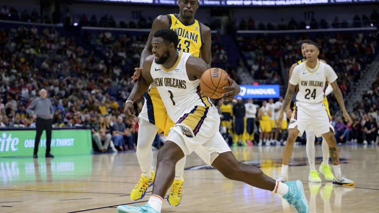 New Orleans Pelicans forward Zion Williamson (1) dribbles around Indiana Pacers forward Pascal Siakam (43) during the second half of an NBA basketball game in New Orleans, Friday, Nov. 1, 2024.