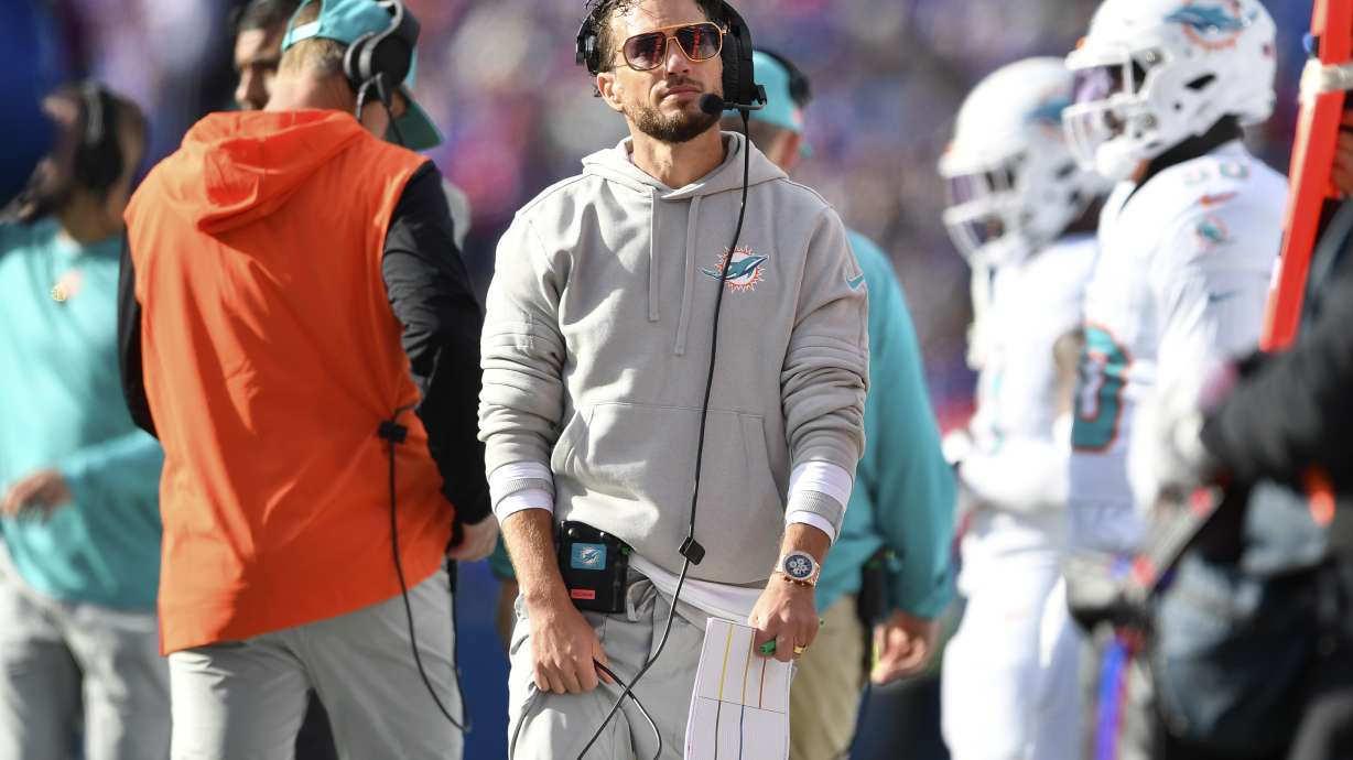 Miami Dolphins head coach Mike McDaniel walks on the sideline during the first half of an NFL football game against the Buffalo Bills, Sunday, Nov. 3, 2024, in Orchard Park, N.Y.