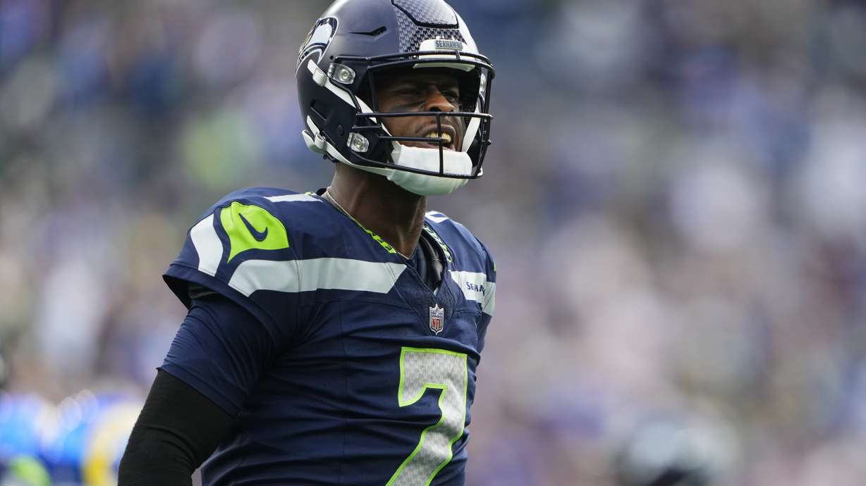 Seattle Seahawks quarterback Geno Smith (7) reacts during the first half of an NFL football game against the Los Angeles Rams in Seattle, Sunday, Nov. 3, 2024.