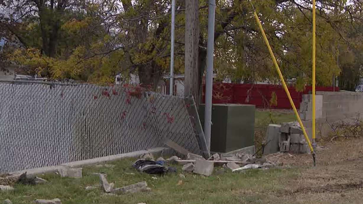 A woman died and two other people were injured when the car they were in crashed at the Taylorsville Cemetery in Taylorsville late Saturday.