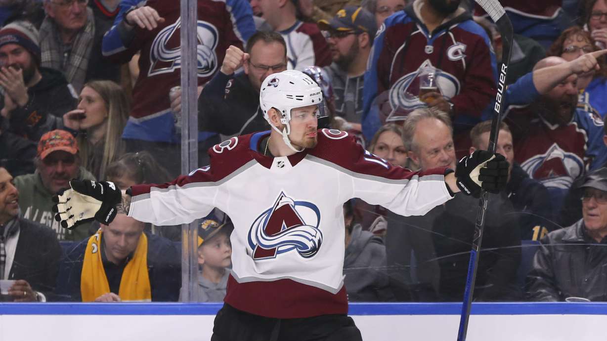 FILE - Colorado Avalanche forward Valeri Nichushkin celebrates his goal during the second period of the team's NHL hockey game against the Buffalo Sabres, Feb. 4, 2020, in Buffalo, N.Y.