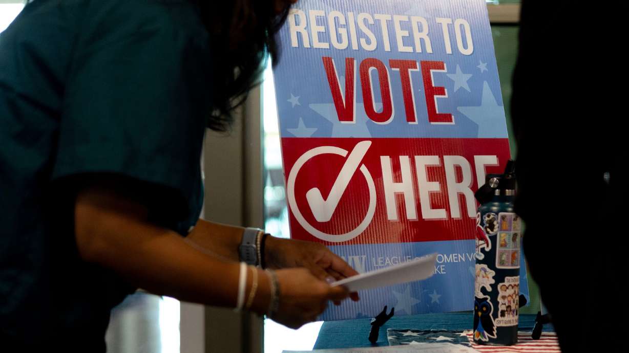 New citizens could register to vote at the League of Women Voters of Salt Lake table following a citizenship oath ceremony at the Utah Cultural Celebration Center in West Valley City on Sept. 13.