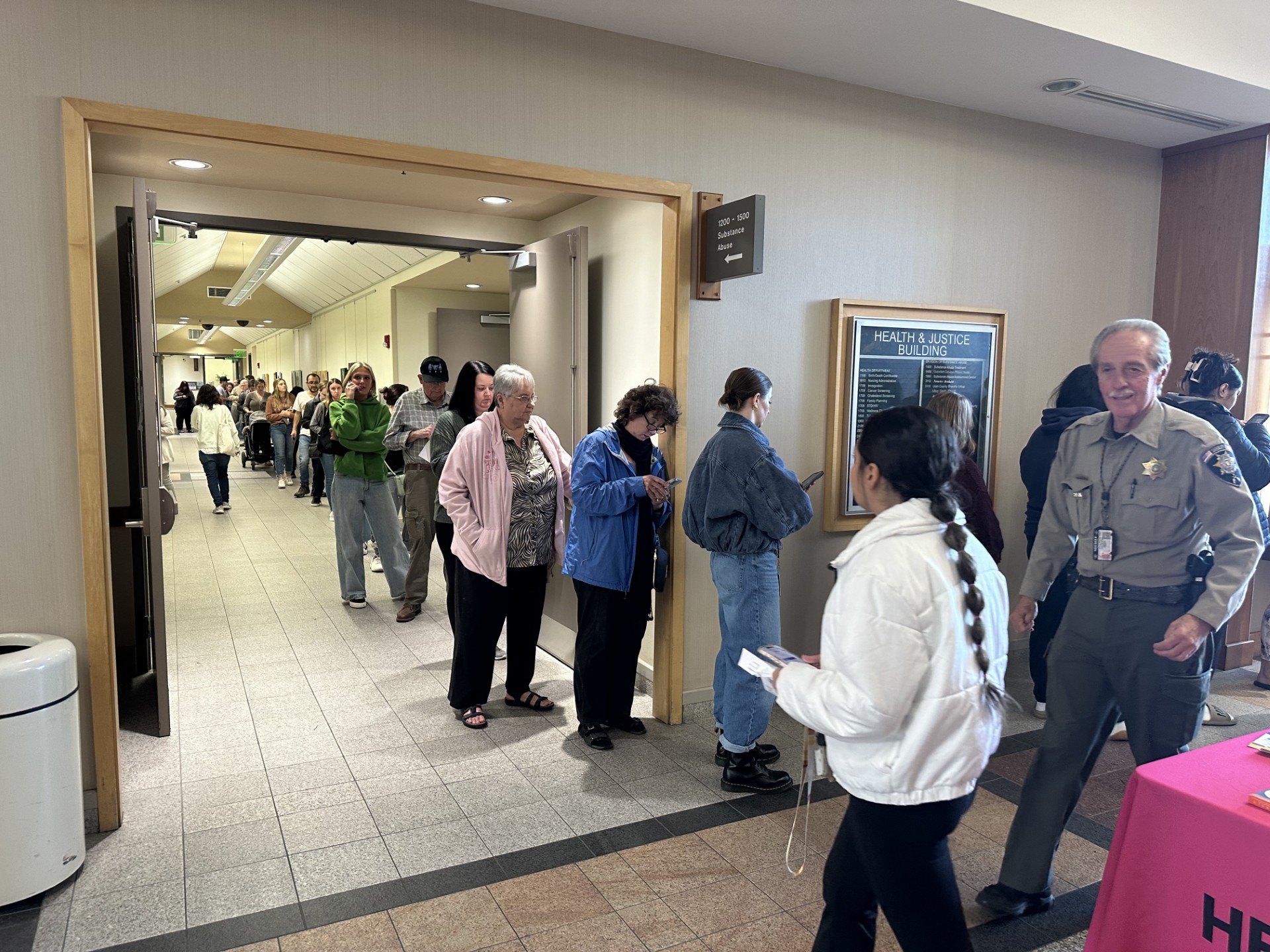 Long days and busy work for poll workers as they try to keep up with crowds