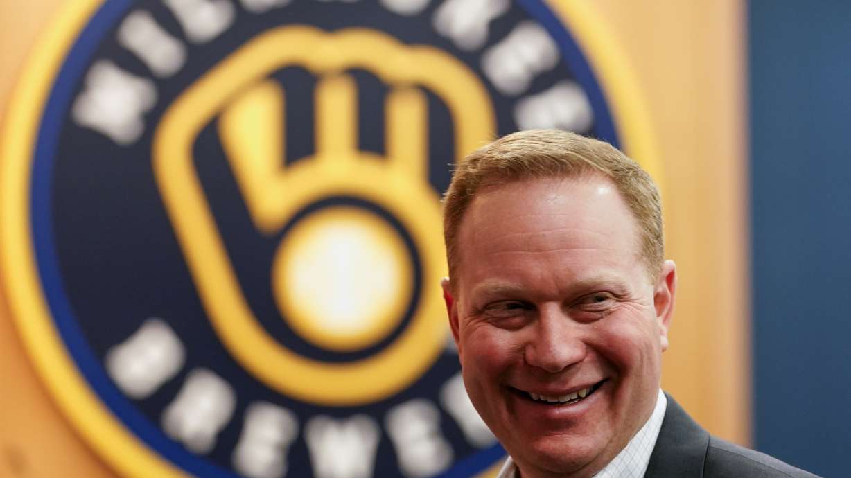 FILE - Milwaukee Brewers new president of baseball operations Matt Arnold smiles at a news conference Thursday, Oct. 27, 2022, in Milwaukee.