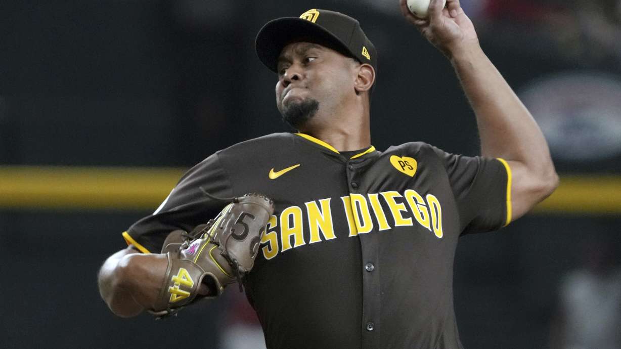 FILE - San Diego Padres pitcher Wandy Peralta (58) throws against the Arizona Diamondbacks in the first inning during a baseball game, Saturday, Sept. 28, 2024, in Phoenix.