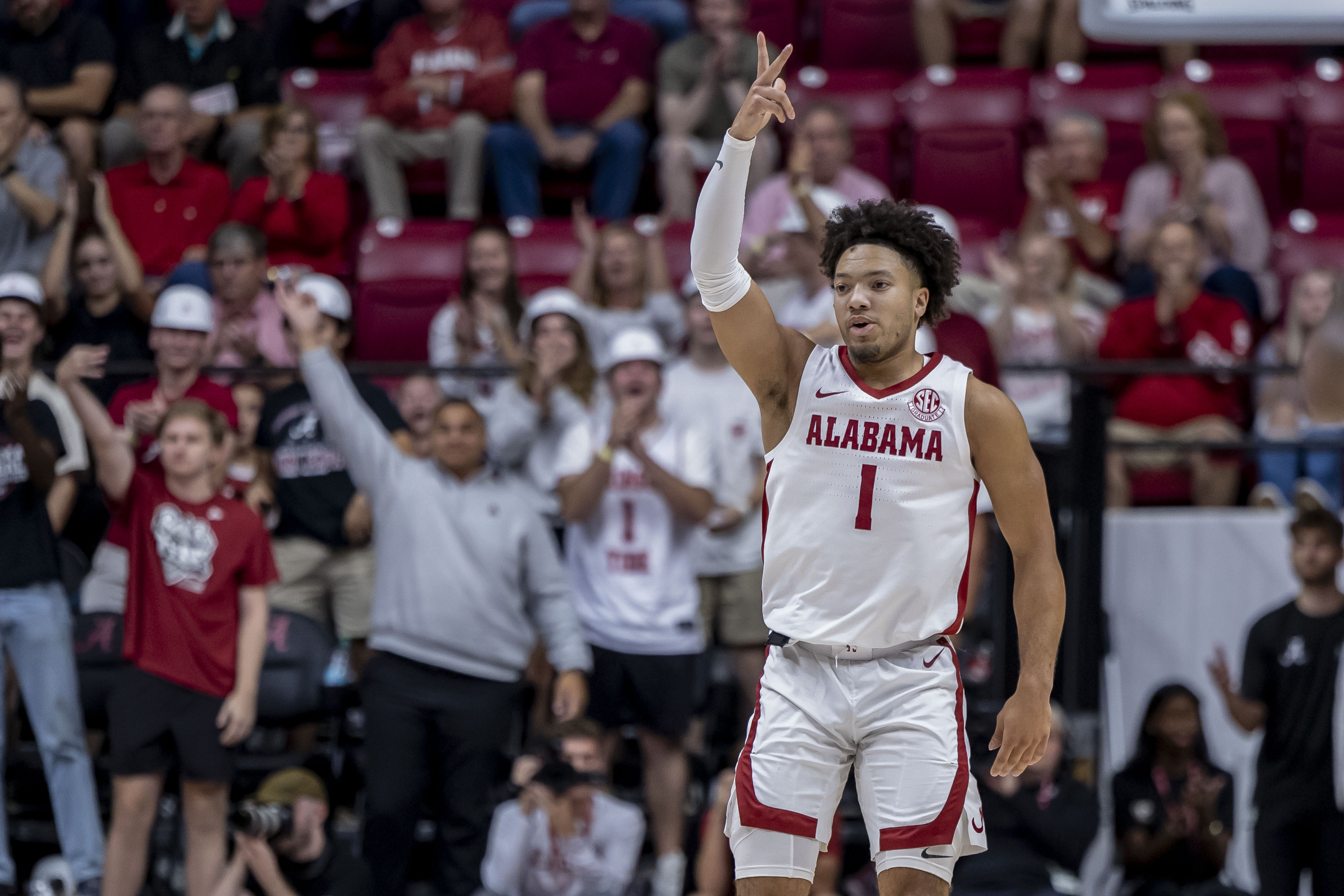 Alabama guard Mark Sears (1) celebrates after his 3-point basket during the first half of an NCAA college basketball game against North Carolina Asheville, Monday, Nov. 4, 2024, in Tuscaloosa, Ala.