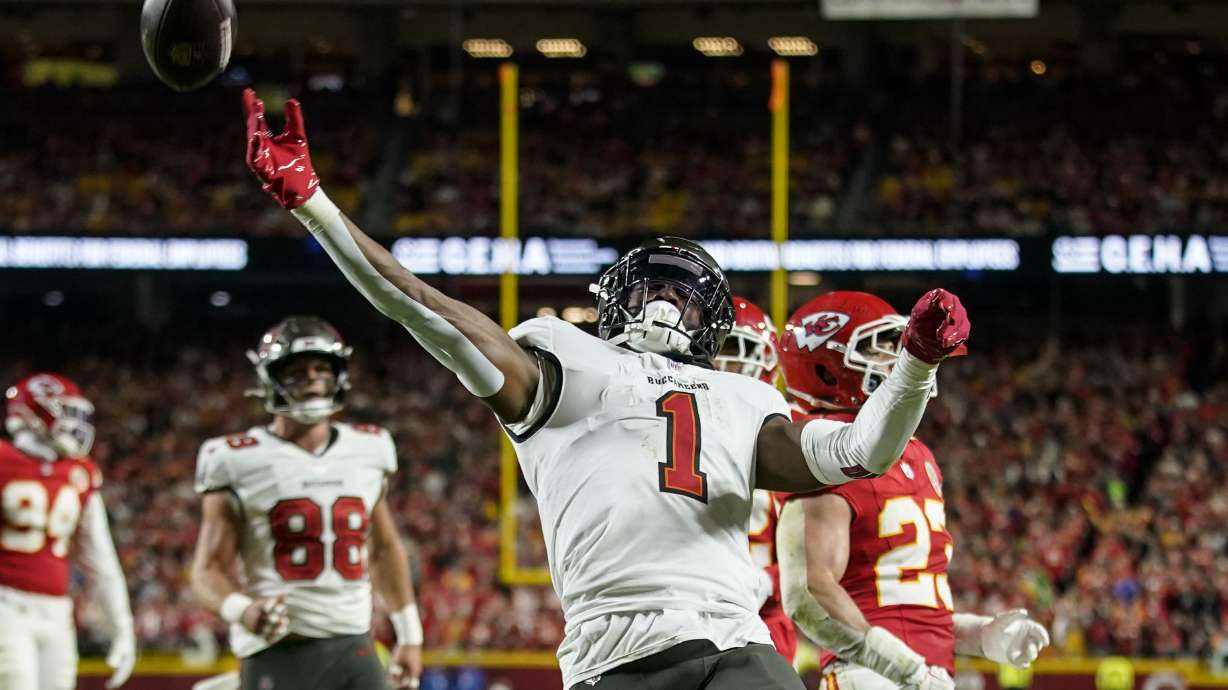Tampa Bay Buccaneers running back Rachaad White (1) celebrates his touchdown against the Kansas City Chiefs during the first half of an NFL football game, Monday, Nov. 4, 2024, in Kansas City, Mo.