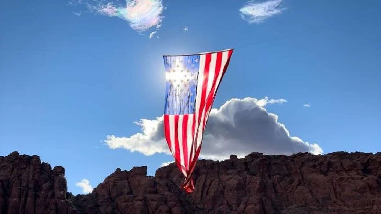 The flag is visible to the left, almost immediately as one enters Snow Canyon State Park on state Route 18 north, St. George, Sunday.