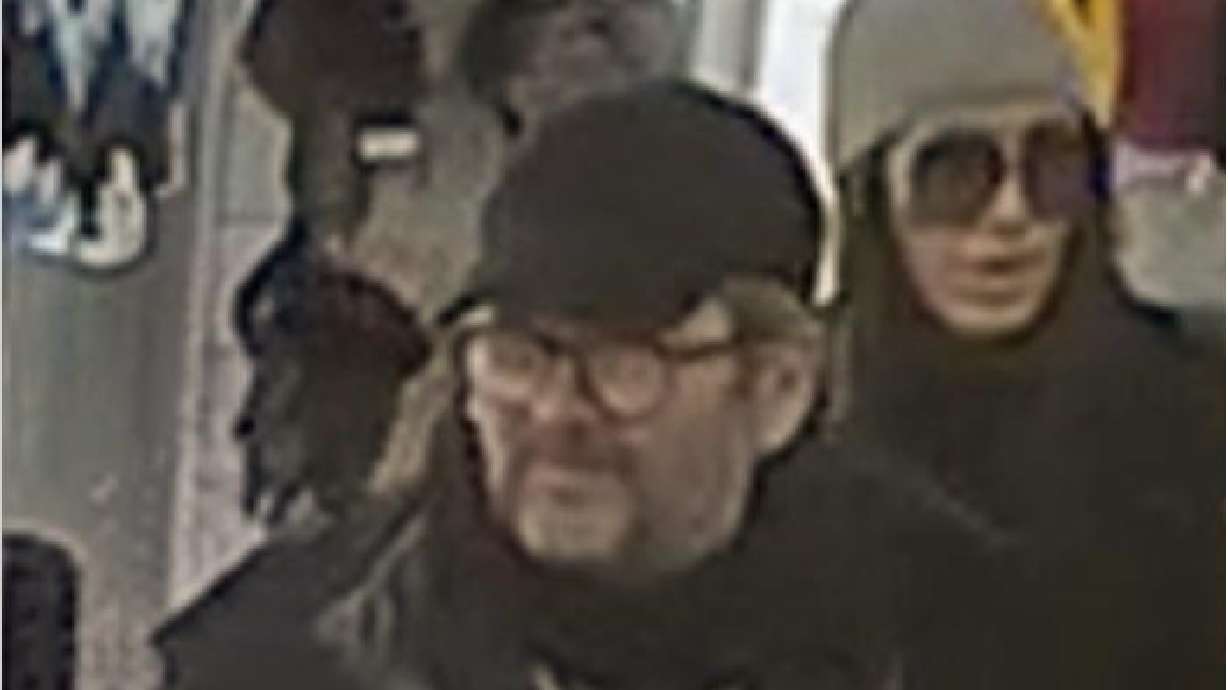 A surveillance image shows a man and woman suspected of stealing a $140,000 fur coat from a Park City fur store on Main Street on Feb. 27. The man was charged with retail theft Monday after he was arrested Friday in New York.