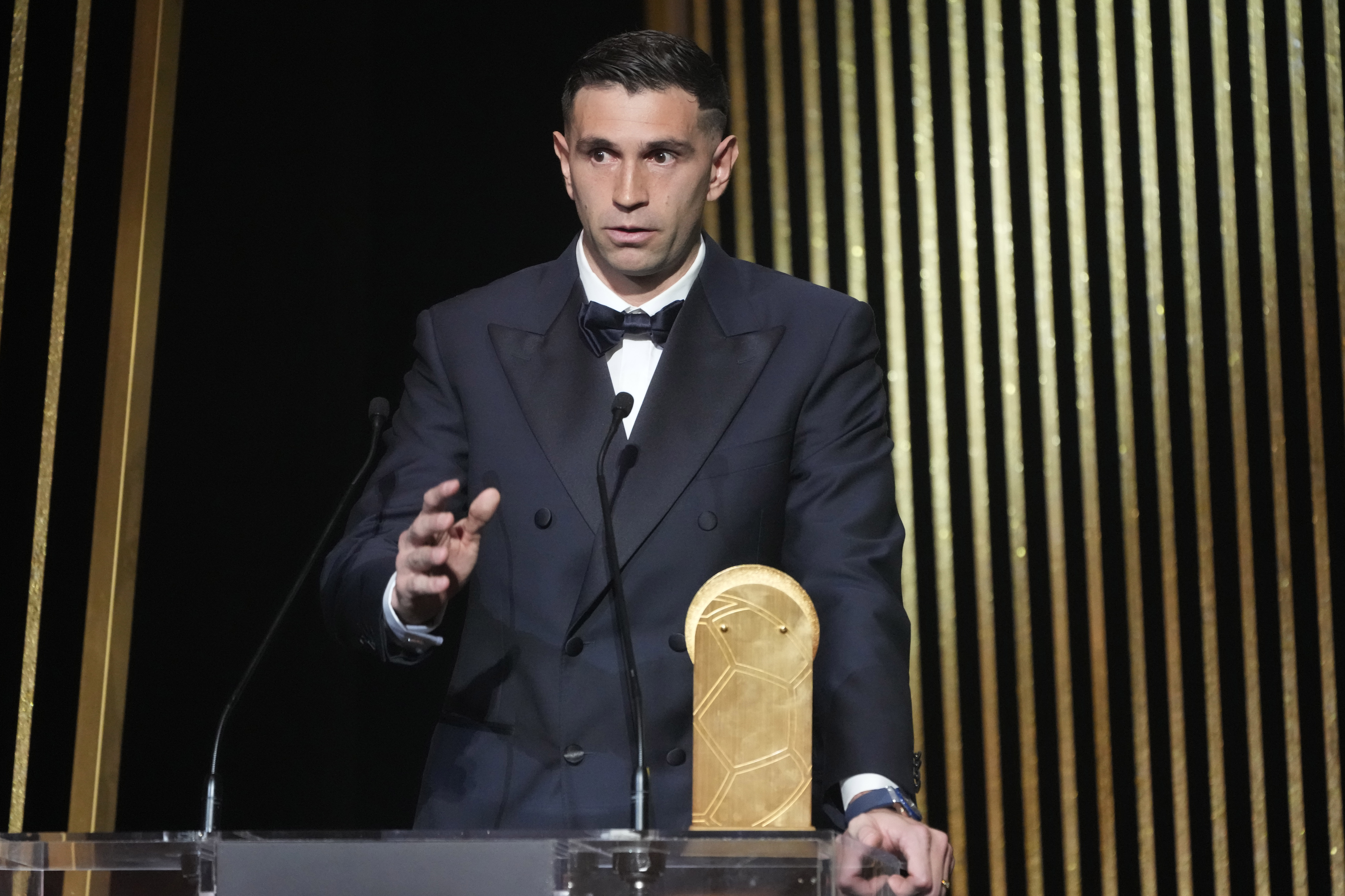 Argentinian goalkeeper Emiliano Martinez receives the Yashin Trophy during the 68th Ballon d'Or (Golden Ball) award ceremony at Theatre du Chatelet in Paris, Monday, Oct. 28, 2024.