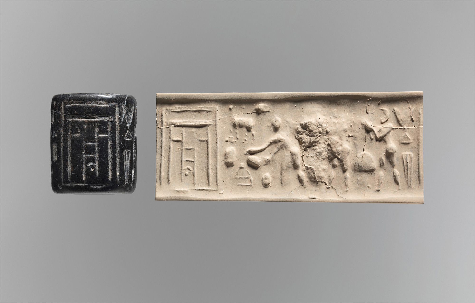 A carved cylinder seal, left, made in the ancient city of Uruk between 3500 and 3100 B.C., is seen next to a sample of the motifs left behind by the seal when it's rolled over clay.