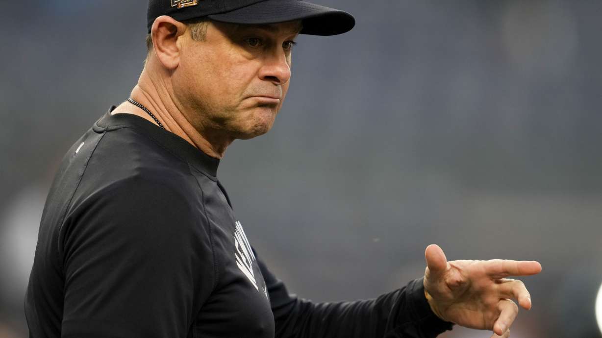New York Yankees manager Aaron Boone watches during batting practice before Game 5 of the baseball World Series against the Los Angeles Dodgers, Wednesday, Oct. 30, 2024, in New York.