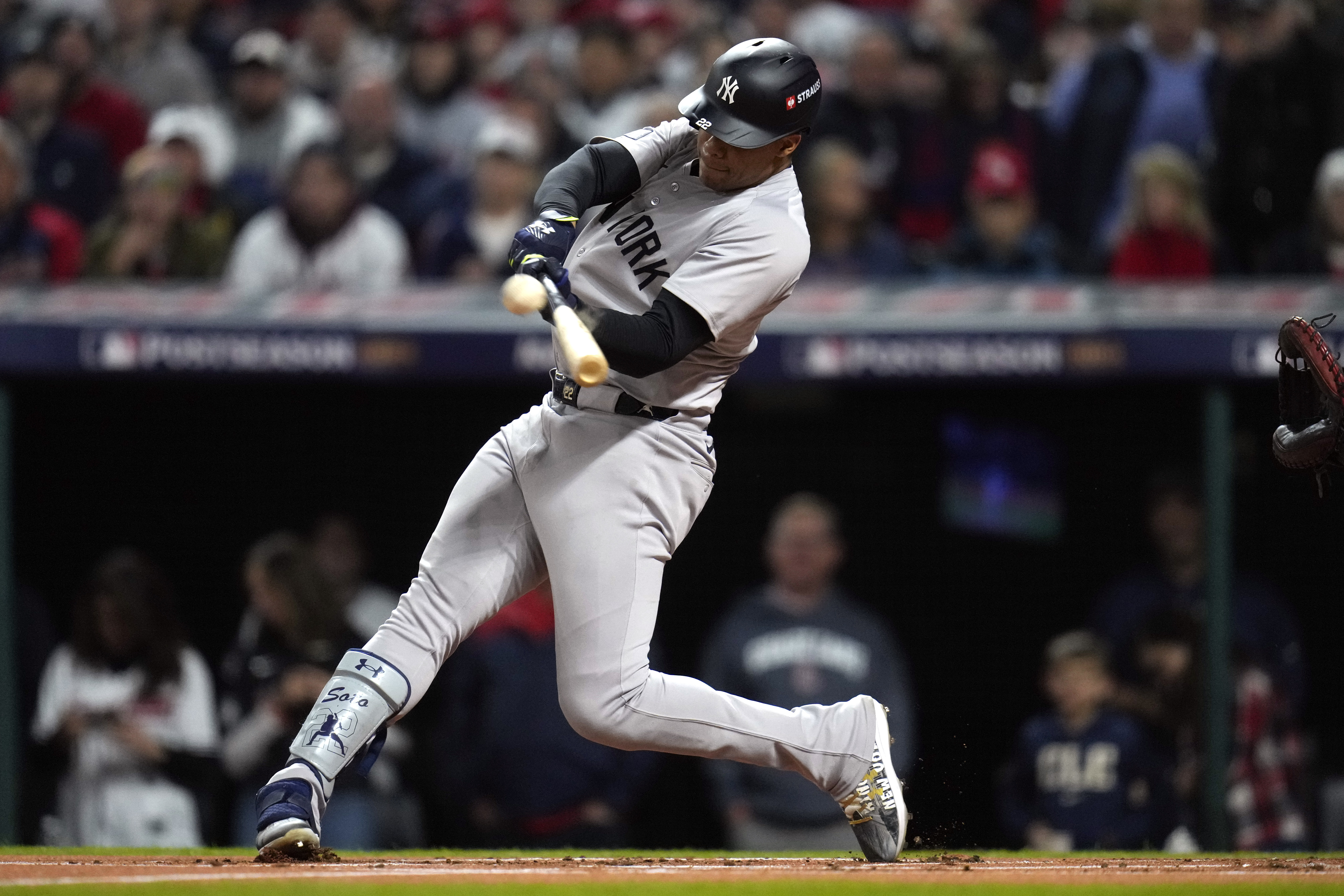 New York Yankees' Juan Soto hits a two-run home run against the Cleveland Guardians during the first inning in Game 4 of the baseball AL Championship Series Friday, Oct. 18, 2024, in Cleveland.