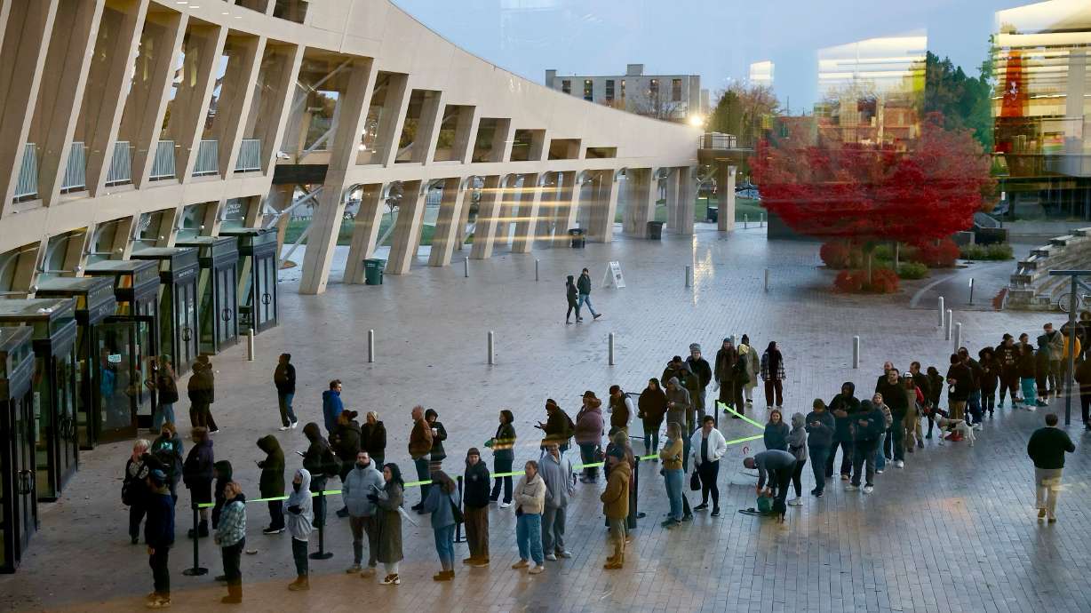 Residents line up outside of the Salt Lake City Library to vote on Nov. 5. Democrat Natalie Pinkney declared victory in the race for Salt Lake County Council At-Large C seat Friday night.