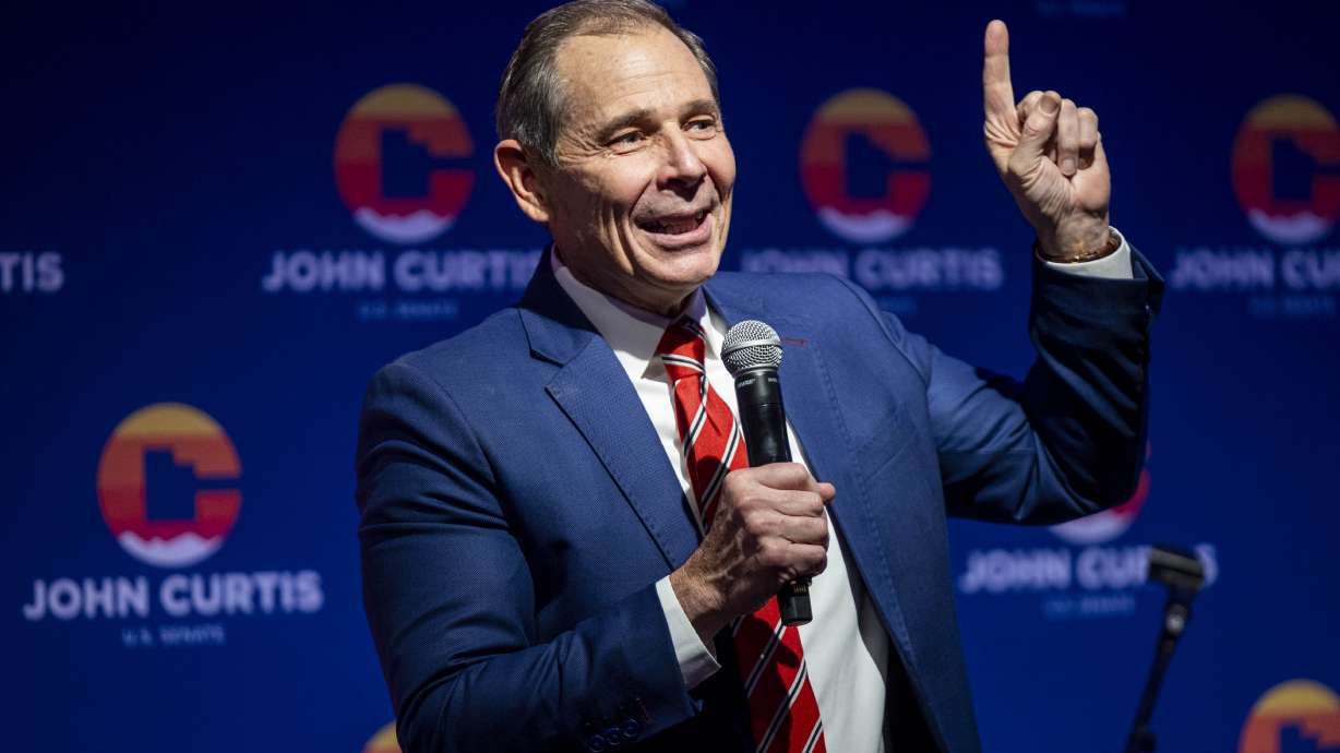 Utah Rep. John Curtis speaks briefly during a watch party for general election results at the Provo Recreation Center on Tuesday. Curtis will replace Sen. Mitt Romney in the U.S. Senate after defeating Democrat Caroline Gleich, according to the Associated Press.