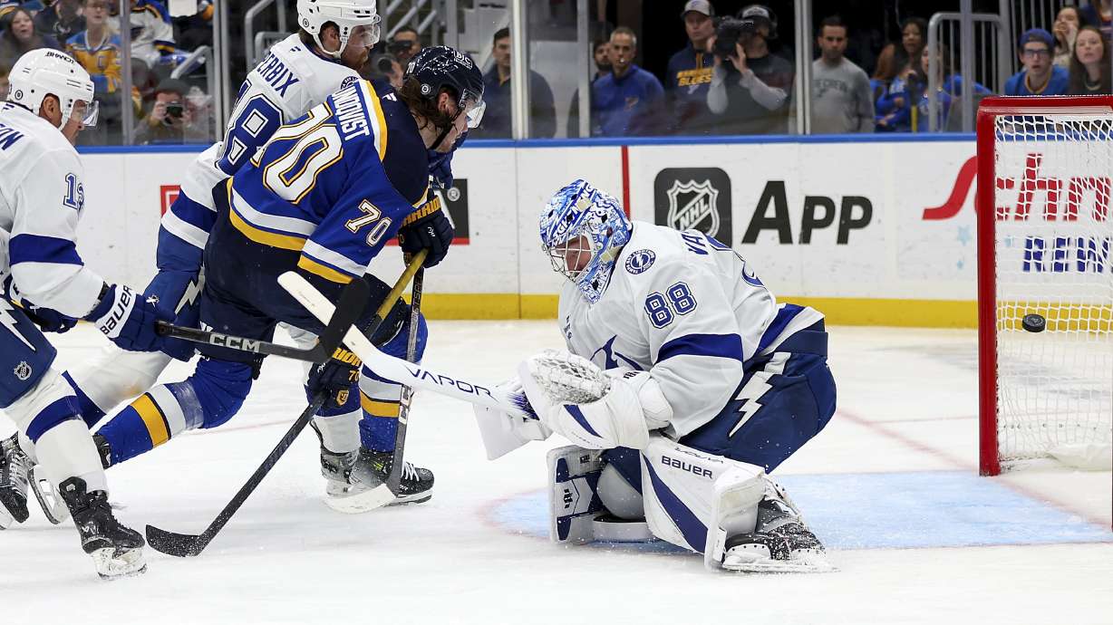 St. Louis Blues' Oskar Sundqvist (70) scores past Tampa Bay Lightning goaltender Andrei Vasilevskiy (88) during the second period of an NHL hockey game Tuesday, Nov. 5, 2024, in St. Louis.