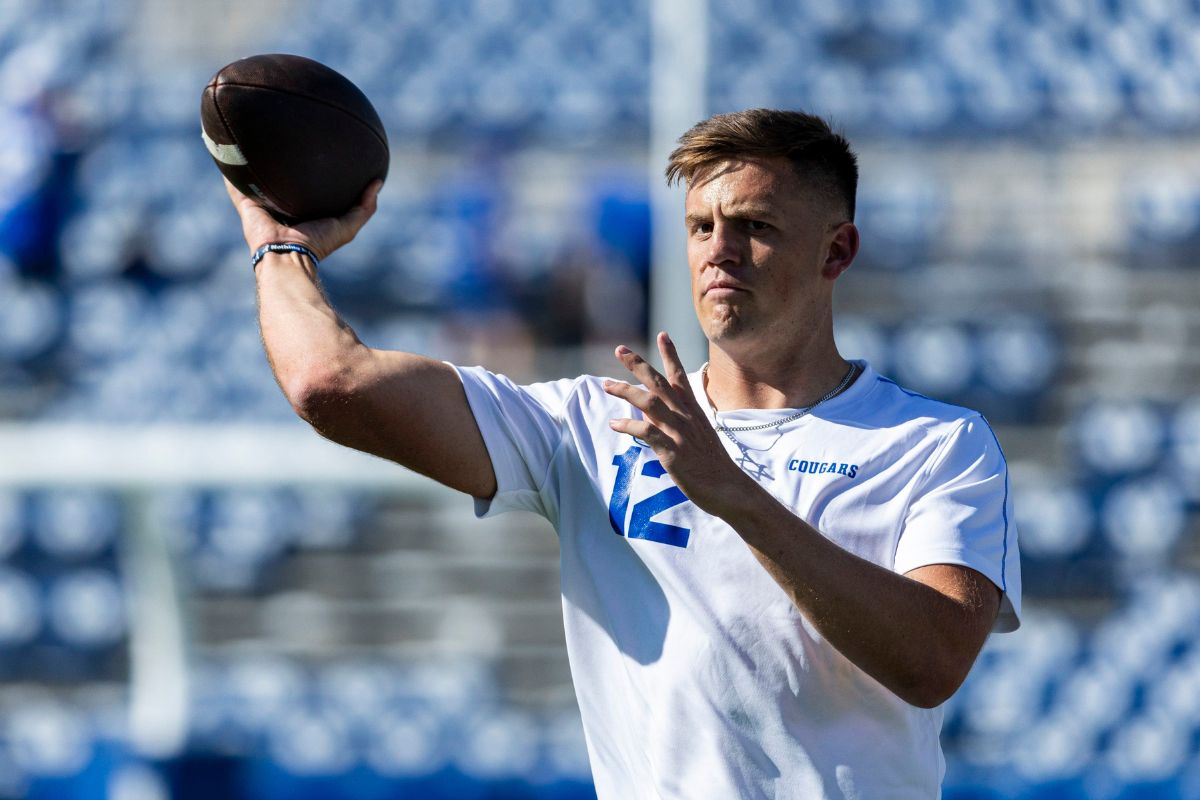 BYU quarterback Jake Retzlaff warms up before the home opener against Southern Illinois at LaVell Edwards Stadium in Provo on Aug. 31. Saturday, the Cougars head to Salt Lake City to face Utah at Rice-Eccles Stadium.