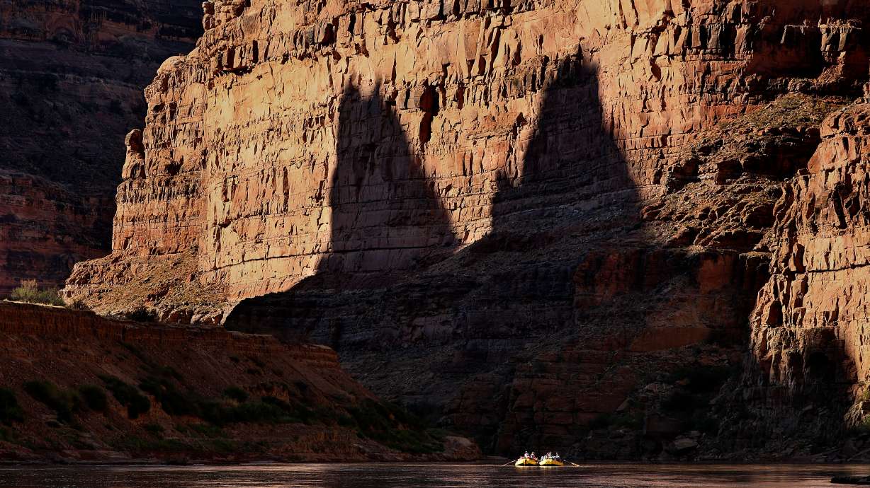 A group of river experts, scientists, water rights lawyers, tribal representatives, nonprofit representatives, philanthropists and river guides raft down Cataract Canyon on the Colorado River with the Returning Rapids Project on Sept. 22.