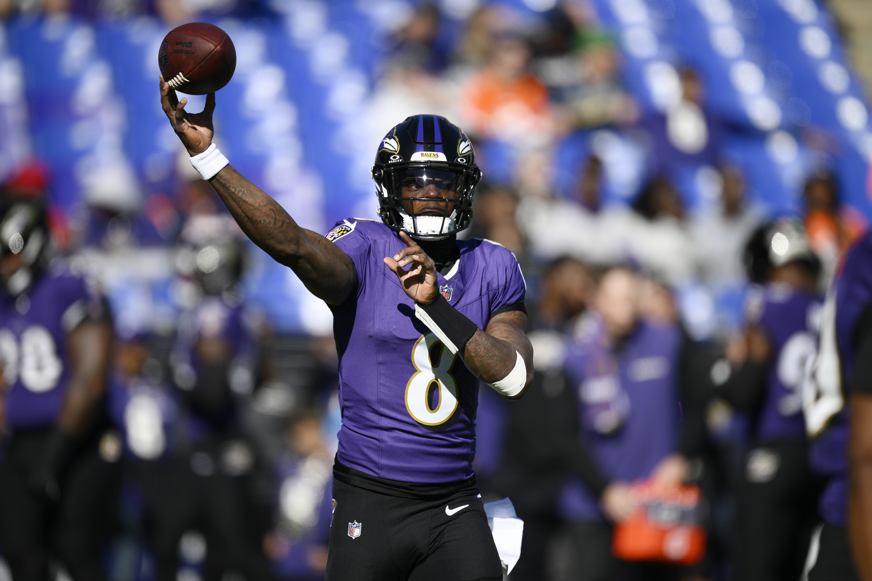 Baltimore Ravens quarterback Lamar Jackson warms up before an NFL football game against the Denver Broncos Sunday, Nov. 3, 2024, in Baltimore.