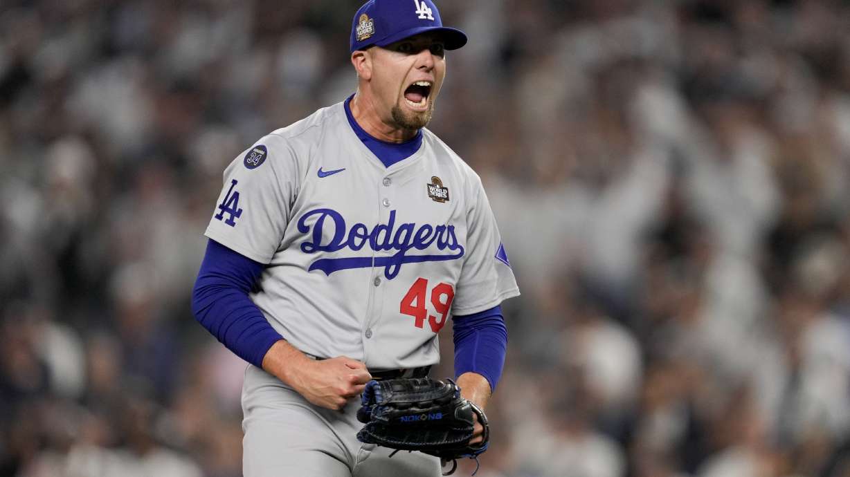 Los Angeles Dodgers pitcher Blake Treinen celebrates the end of the eighth inning in Game 5 of the baseball World Series against the New York Yankees, Wednesday, Oct. 30, 2024, in New York.