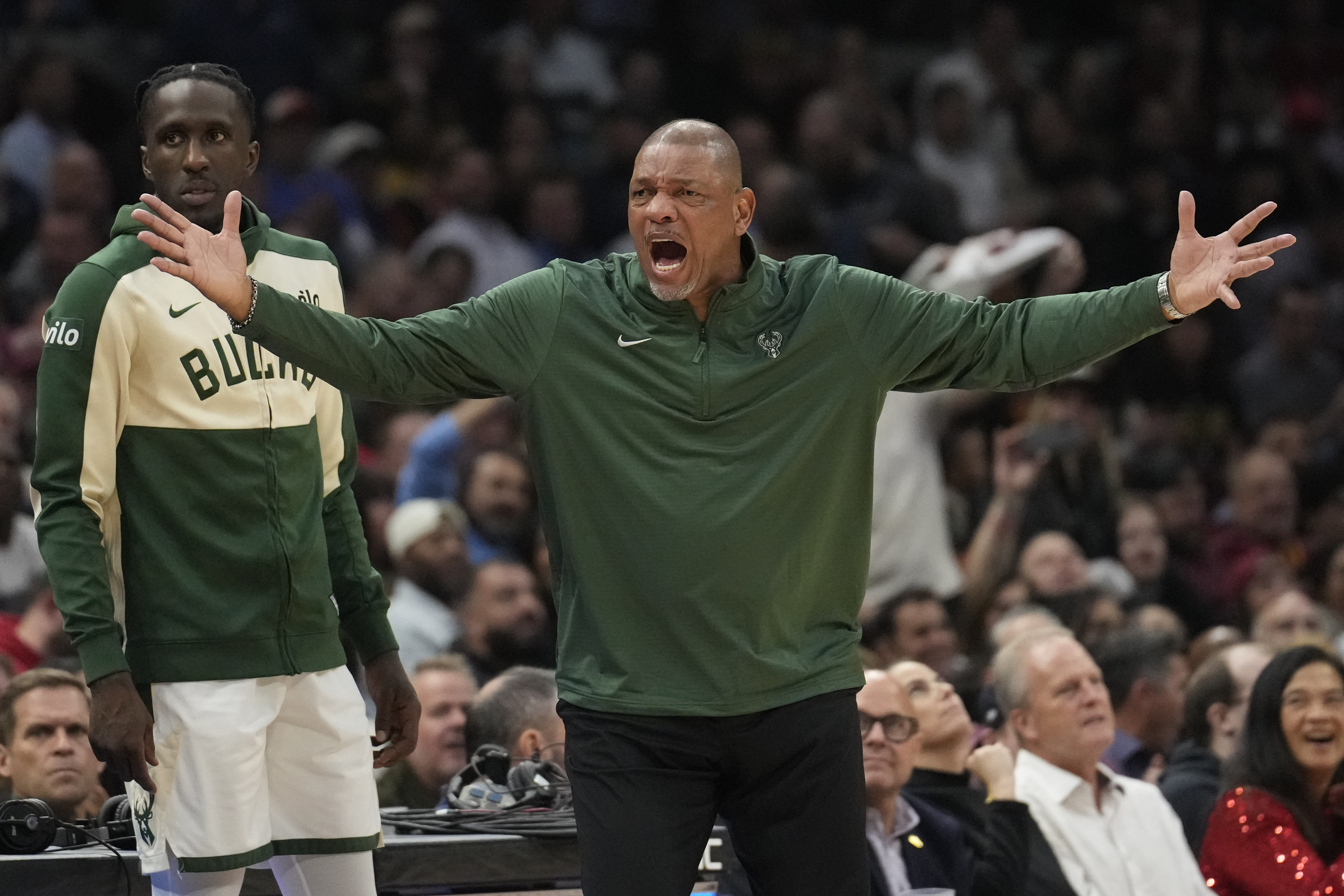 Milwaukee Bucks head coach Doc Rivers shouts to an official in the first half of an NBA basketball game against the Cleveland Cavaliers, Monday, Nov. 4, 2024, in Cleveland.