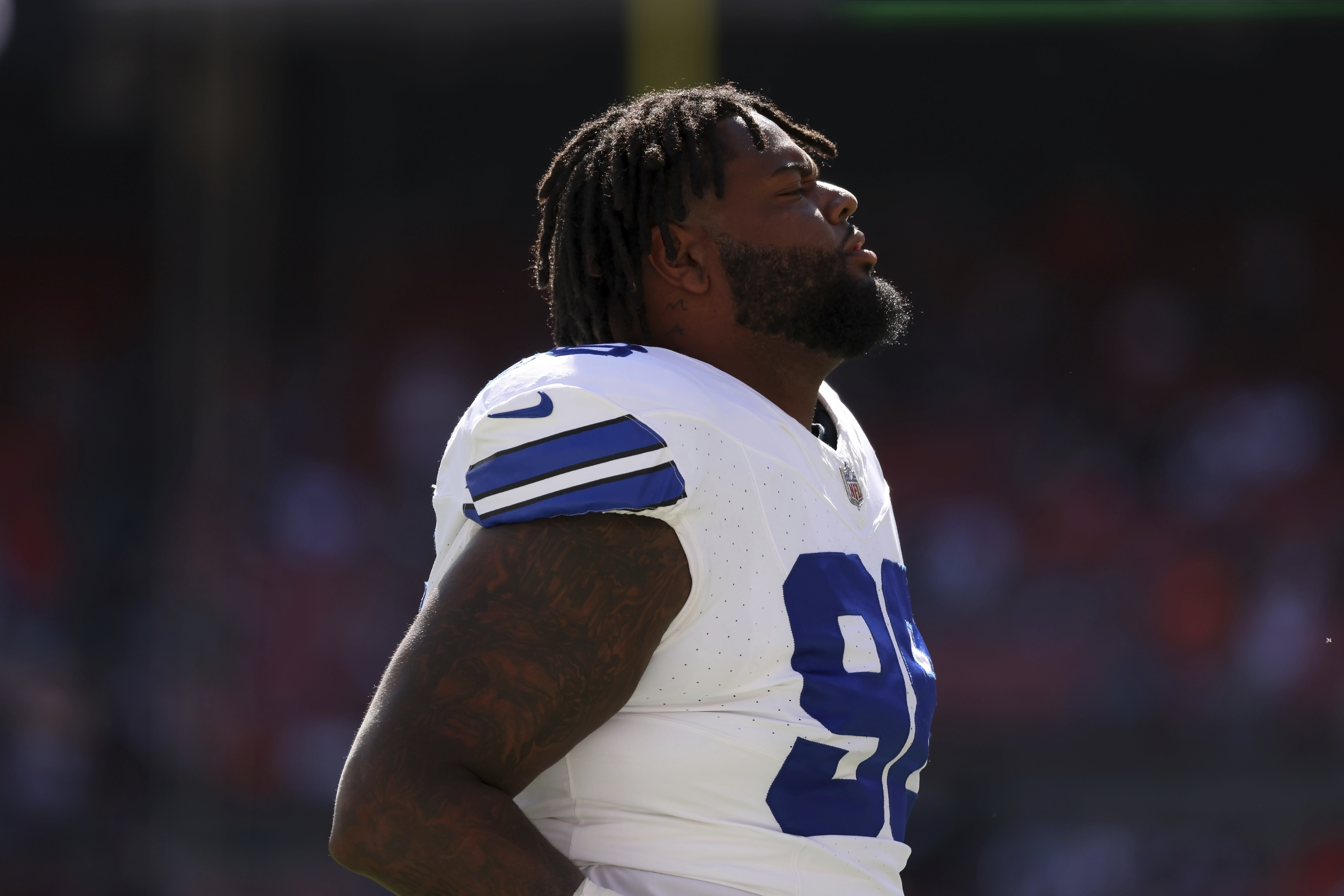 FILE - Dallas Cowboys defensive tackle Jordan Phillips (98) warms up prior to the start of an NFL football game against the Cleveland Browns, Sept. 8, 2024, in Cleveland.