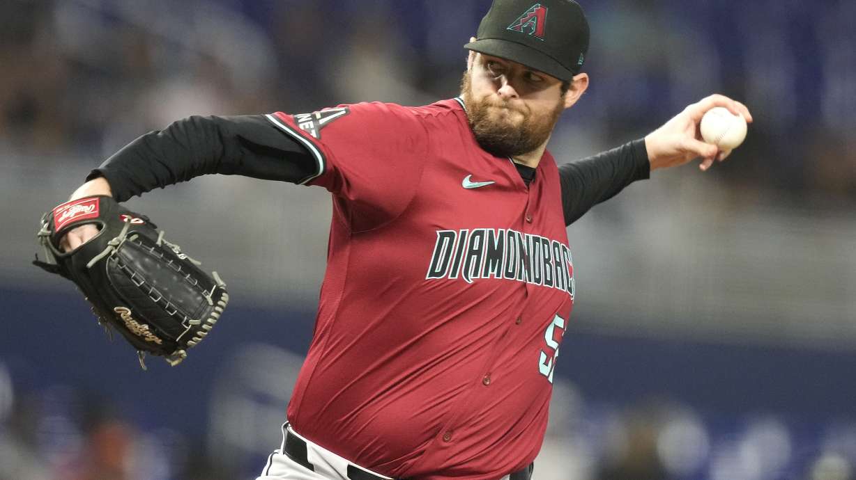 FILE - Arizona Diamondbacks starting pitcher Jordan Montgomery throws during the fourth inning of a baseball game against the Miami Marlins, Wednesday, Aug. 21, 2024, in Miami. Arizona Diamondbacks general manager Mike Hazen said on Wednesday, Nov. 6, 2024 that he’s met with left-hander Jordan Montgomery in an effort to move past team owner Ken Kendrick’s harsh public criticism after the season.