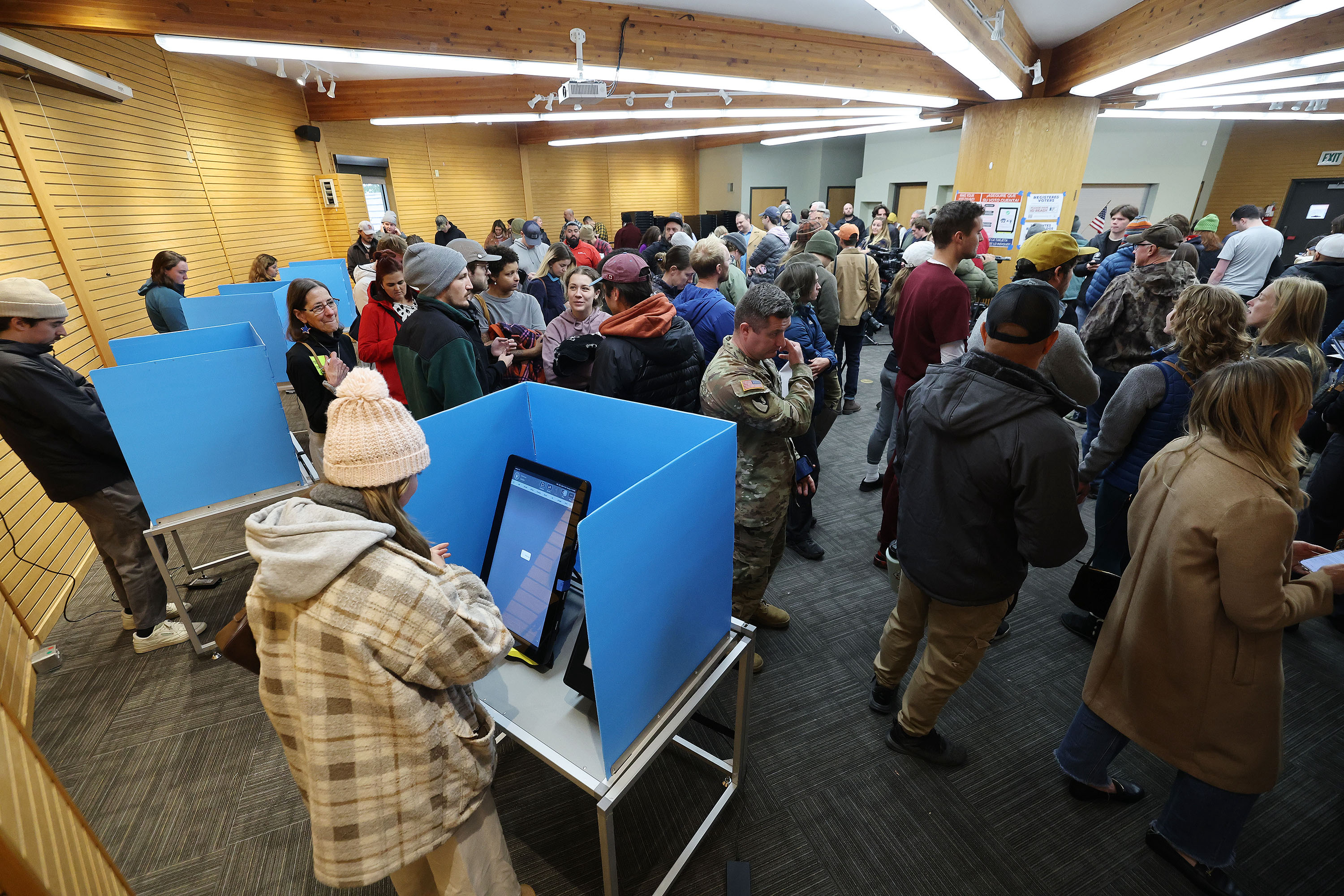 Voters stand in an hourlong line at Hogle Zoo in Salt Lake City on Tuesday. The Utah Legislature is in line to get a fresh crop of lawmakers.
