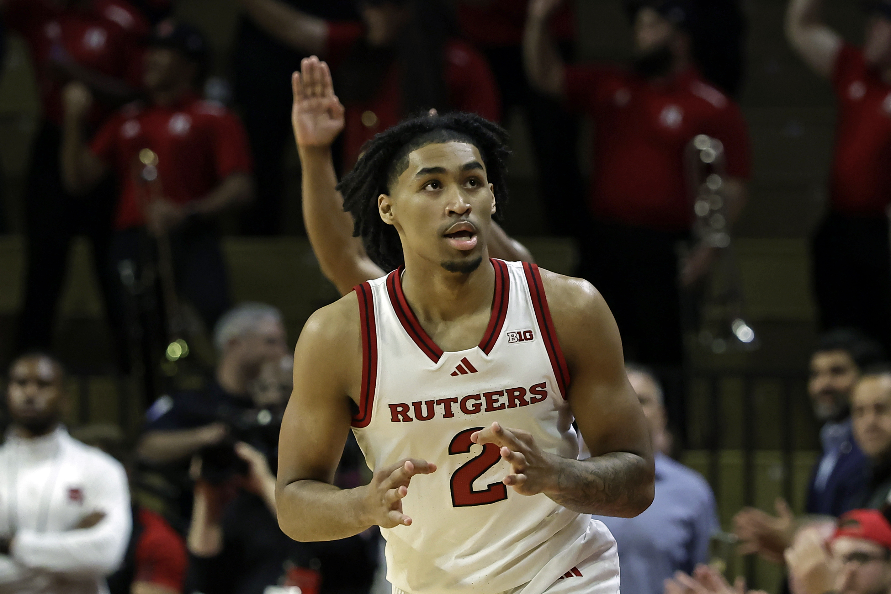 Rutgers guard Dylan Harper (2) reacts after making a three-point basket during the first half of an NCAA college basketball game against Wagner Wednesday, Nov. 6, 2024, in Piscataway, N.J.