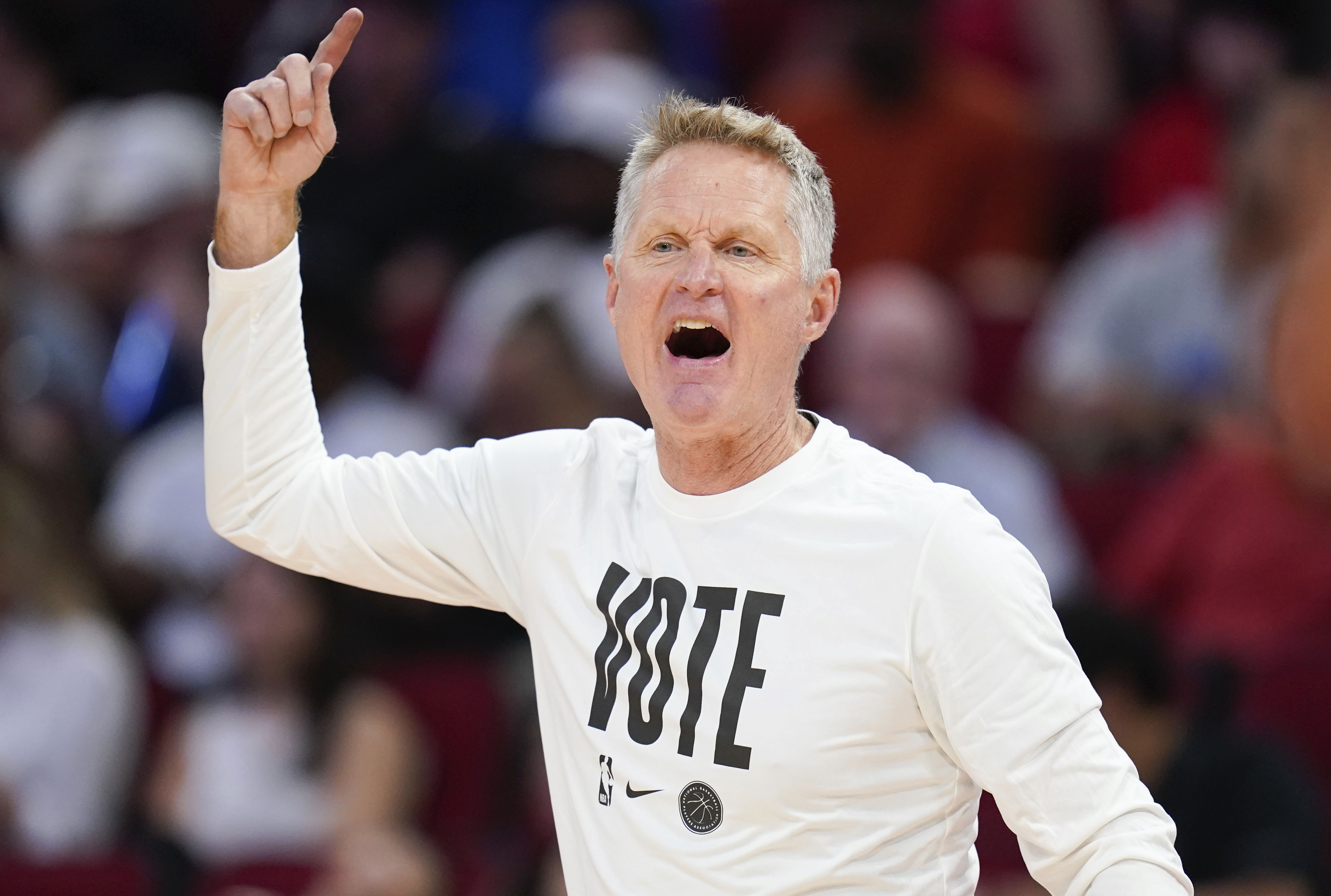 Golden State Warriors head coach Steve Kerr yells from the sideline during the first half of an NBA basketball game against the Houston Rockets, Saturday Nov. 2, 2024, in Houston.