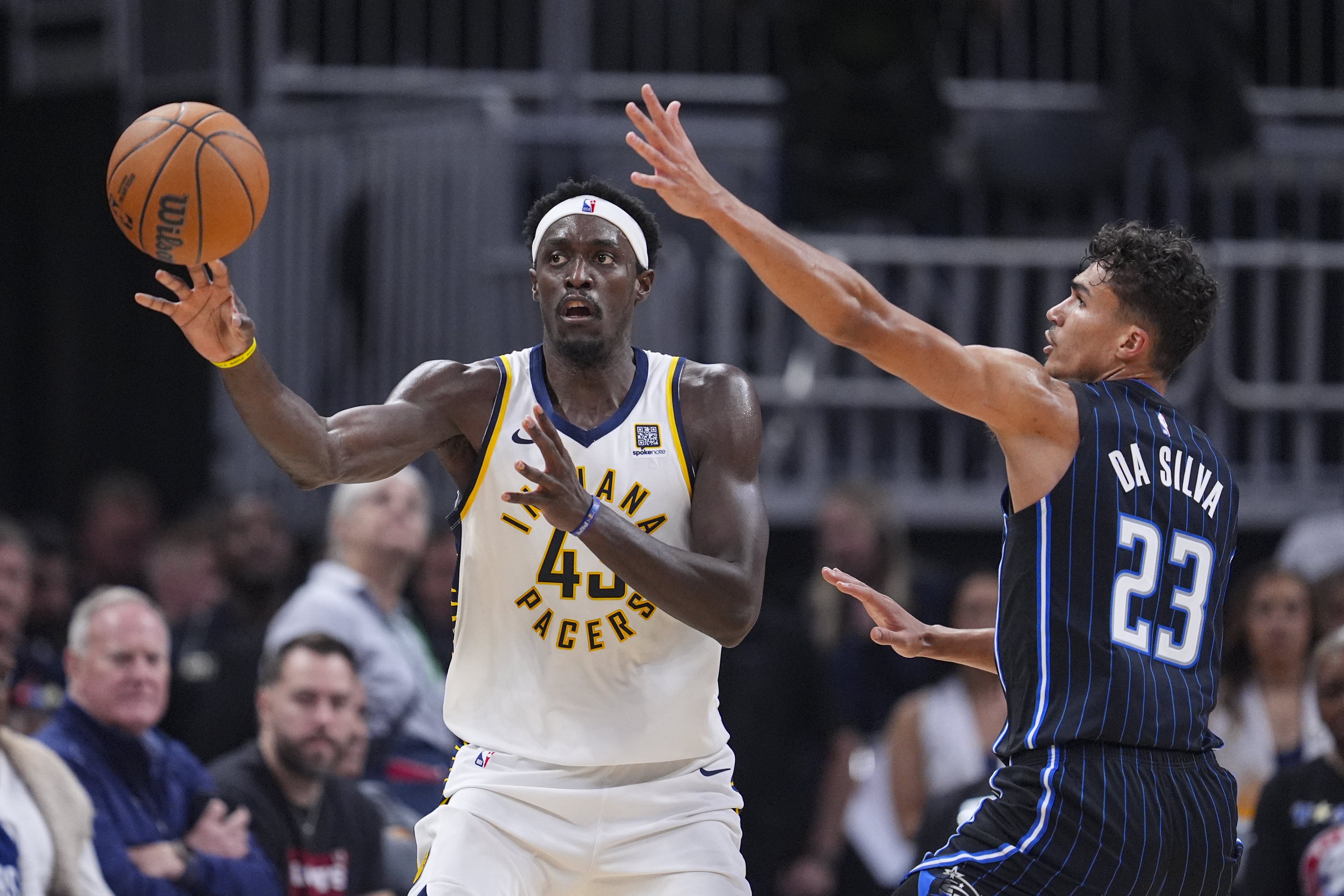 Indiana Pacers forward Pascal Siakam (43) makes a pass around Orlando Magic forward Tristan da Silva (23) during the first half of an NBA basketball game in Indianapolis, Wednesday, Nov. 6, 2024.