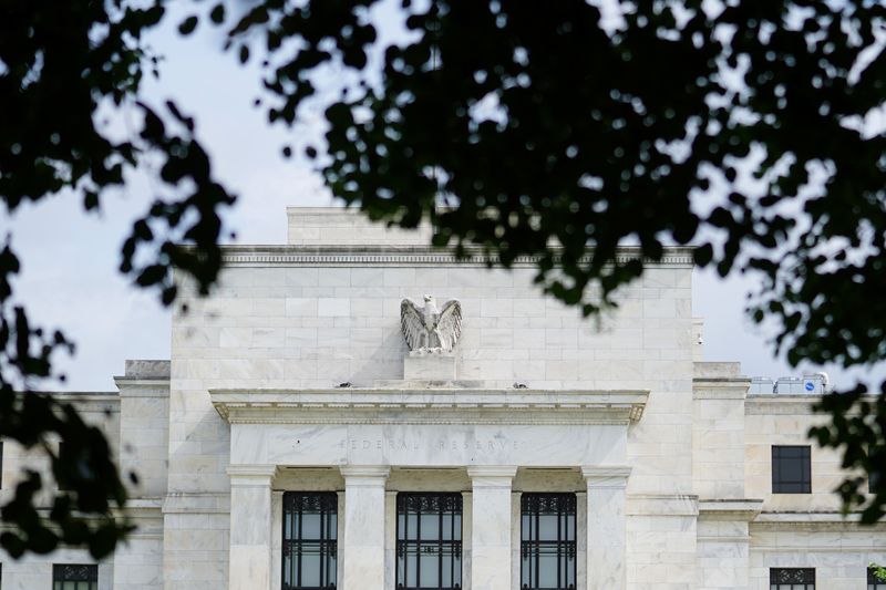 Fed cuts rates, notes labor market easing and solid economic growth