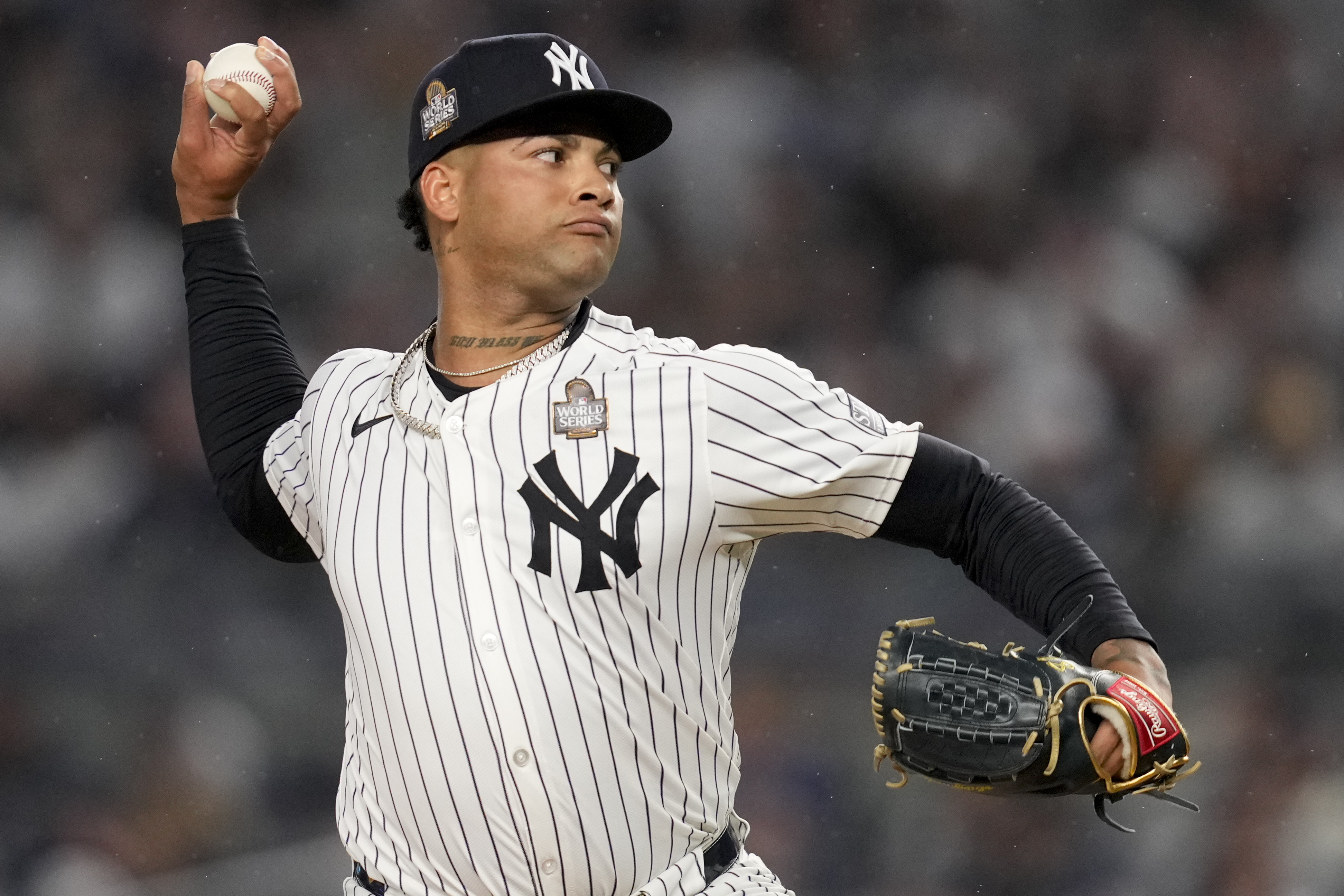 New York Yankees pitcher Luis Gil throws against the Los Angeles Dodgers during the first inning in Game 4 of the baseball World Series, Tuesday, Oct. 29, 2024, in New York.