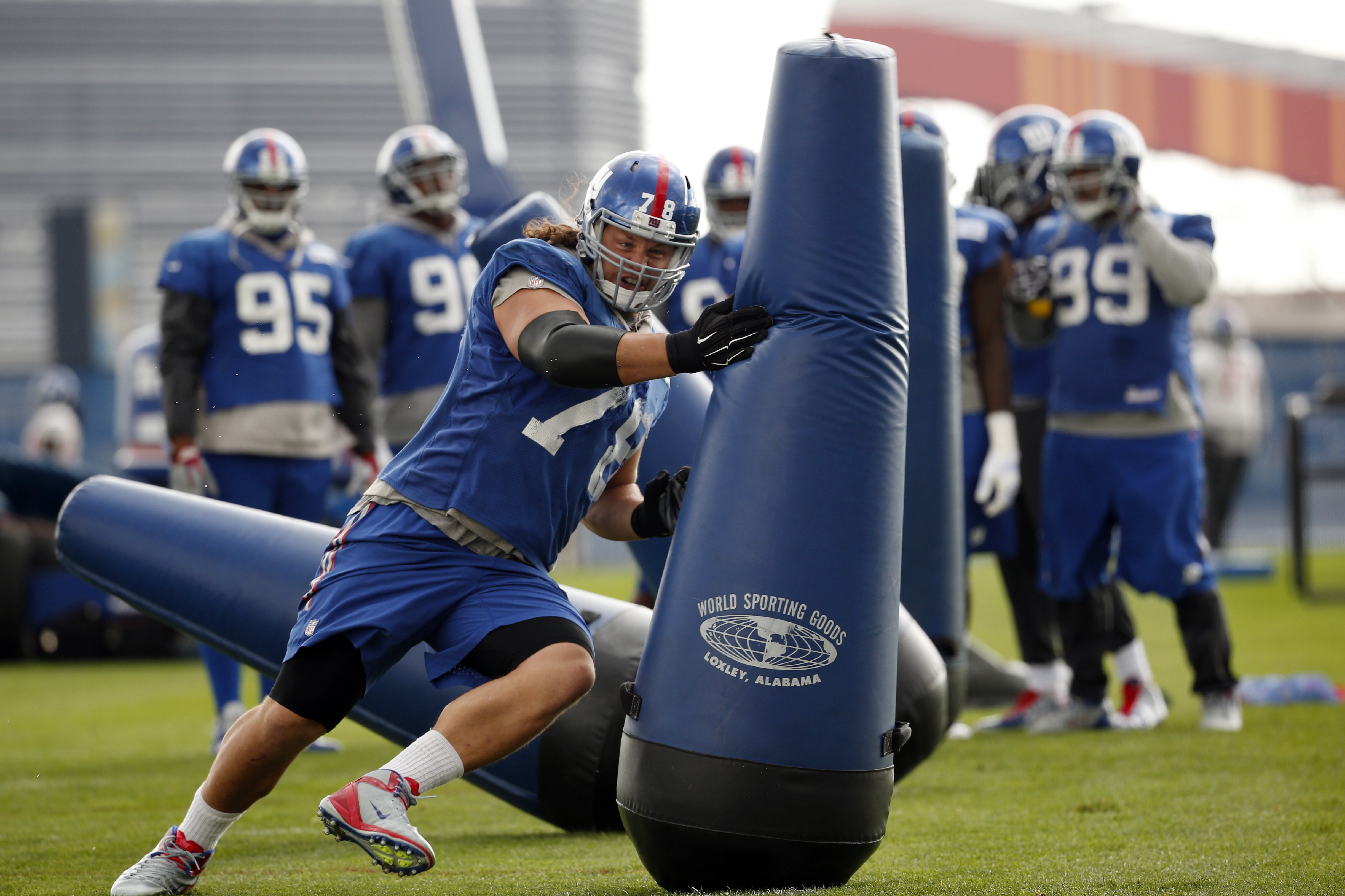 FILE - New York Giants defensive tackle Markus Kuhn works out during NFL football practice, Oct. 29, 2015, in East Rutherford, N.J.