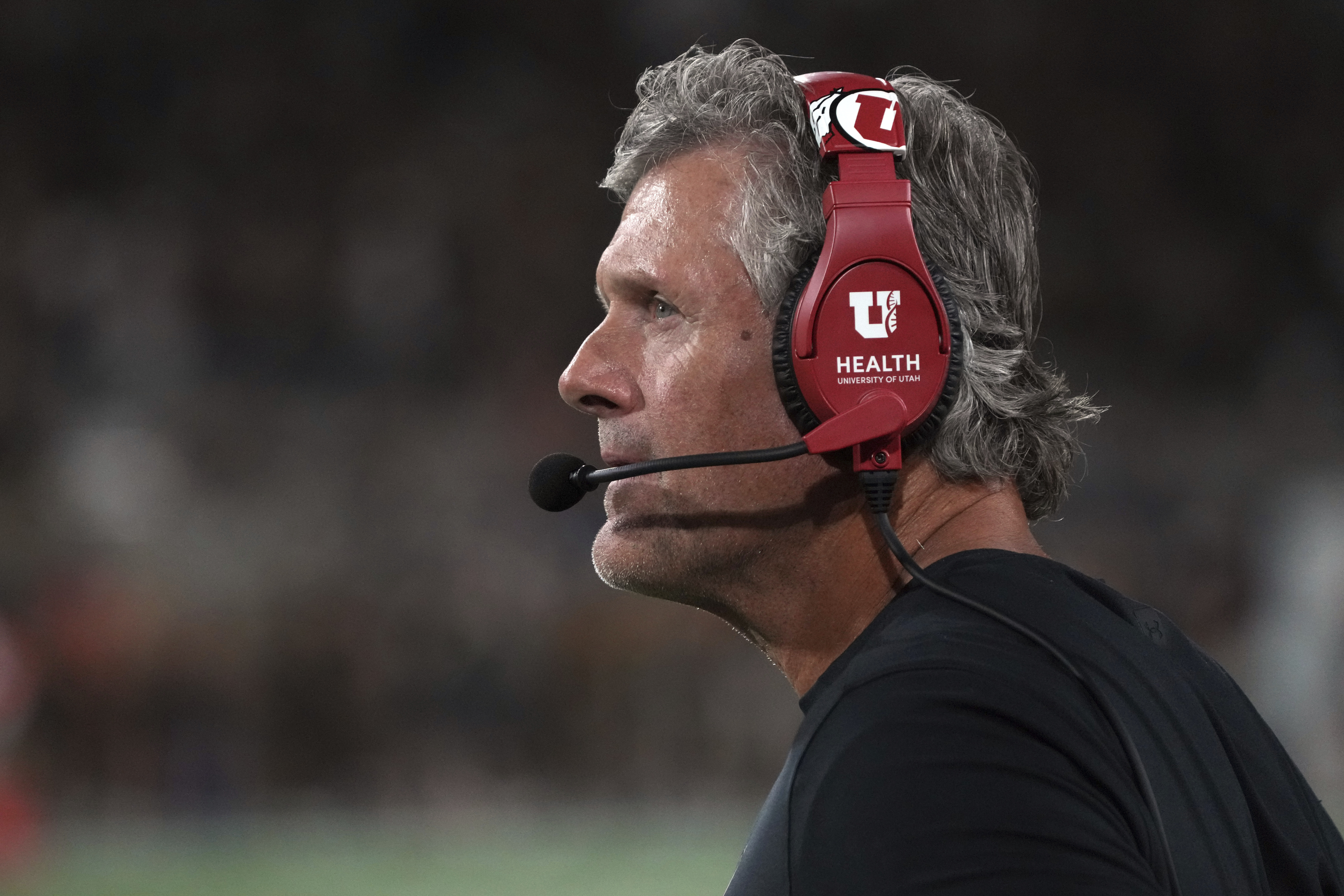 Utah head coach Kyle Whittingham watches the clock in the second half during an NCAA college football game against Arizona State, Friday, Oct. 11, 2024, in Tempe, Ariz. Arizona State won 27-19.