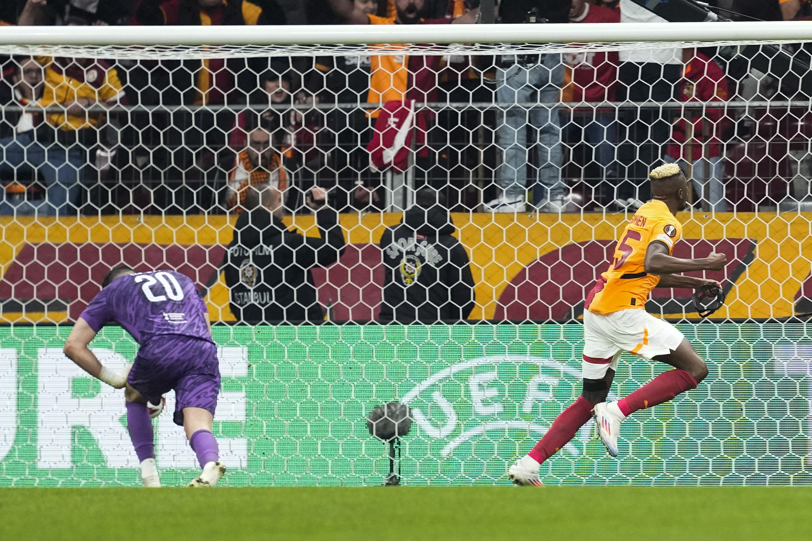 Galatasaray's Victor Osimhen celebrates after scoring his side's third goal during the Europa League opening phase soccer match between Galatasaray and Tottenham Hotspur at Ali Sami Yen stadium, in Istanbul, Turkey, Thursday, Nov. 7, 2024.