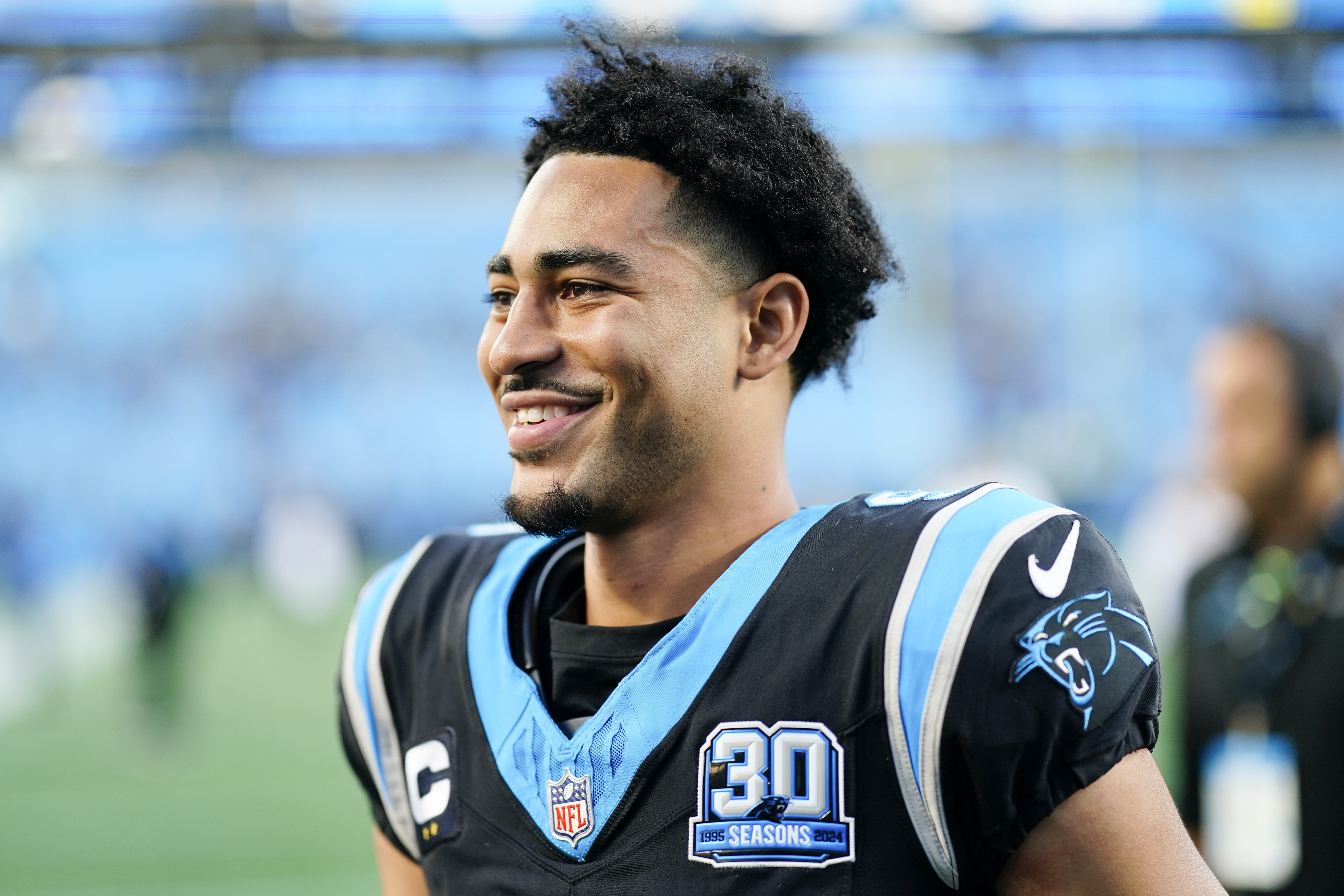 Carolina Panthers quarterback Bryce Young smiles after their win against the New Orleans Saints in an NFL football game Sunday, Nov. 3, 2024, in Charlotte, N.C.