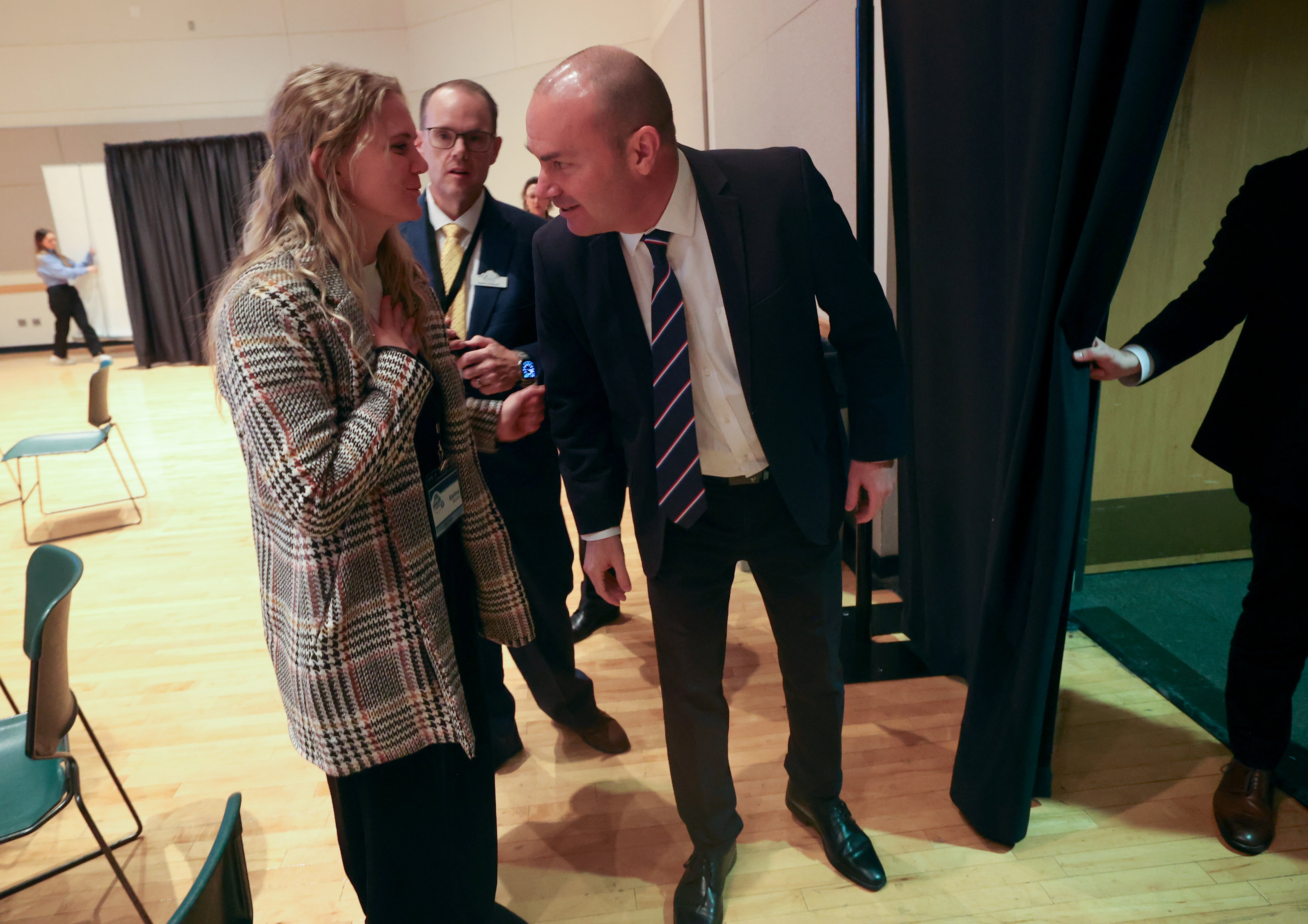 Karina Blocker talks to Sen. Mike Lee, R-Utah, after Lee spoke at the Utah Valley Growth and Prosperity Summit at Utah Valley University in Orem on Thursday.