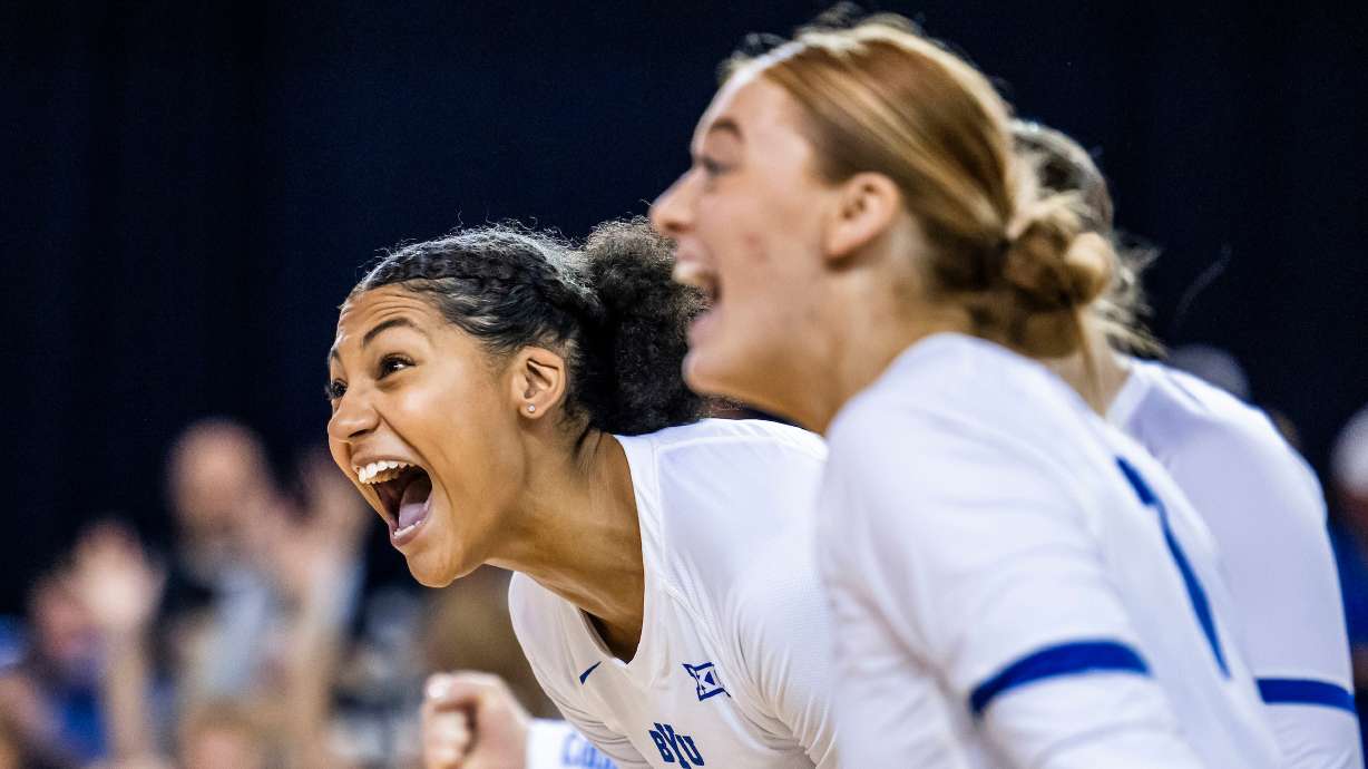 BYU middle blocker Brielle Kemavor celebrates a point with setter Alex Bower during a Big 12 women's volleyball match against Arizona, Saturday, Nov. 2, 2024 at the Smith Fieldhouse in Provo.
