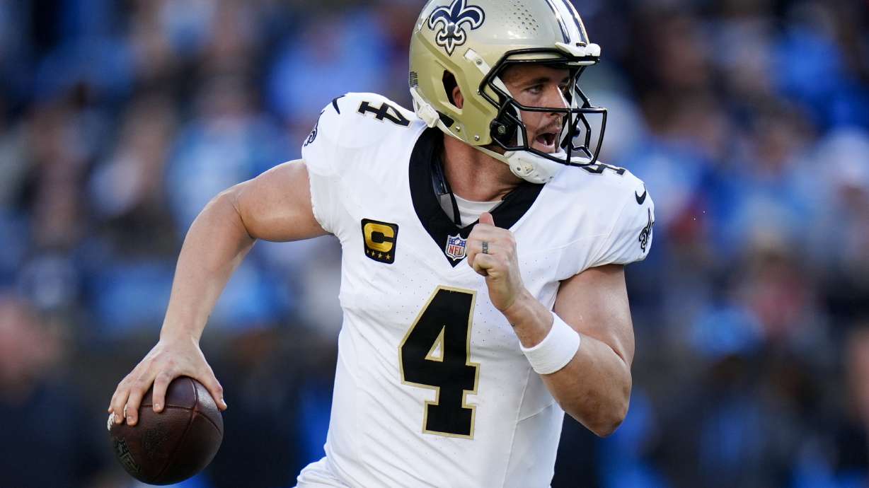 New Orleans Saints quarterback Derek Carr plays against the Carolina Panthers during the second half of an NFL football game Sunday, Nov. 3, 2024, in Charlotte, N.C.