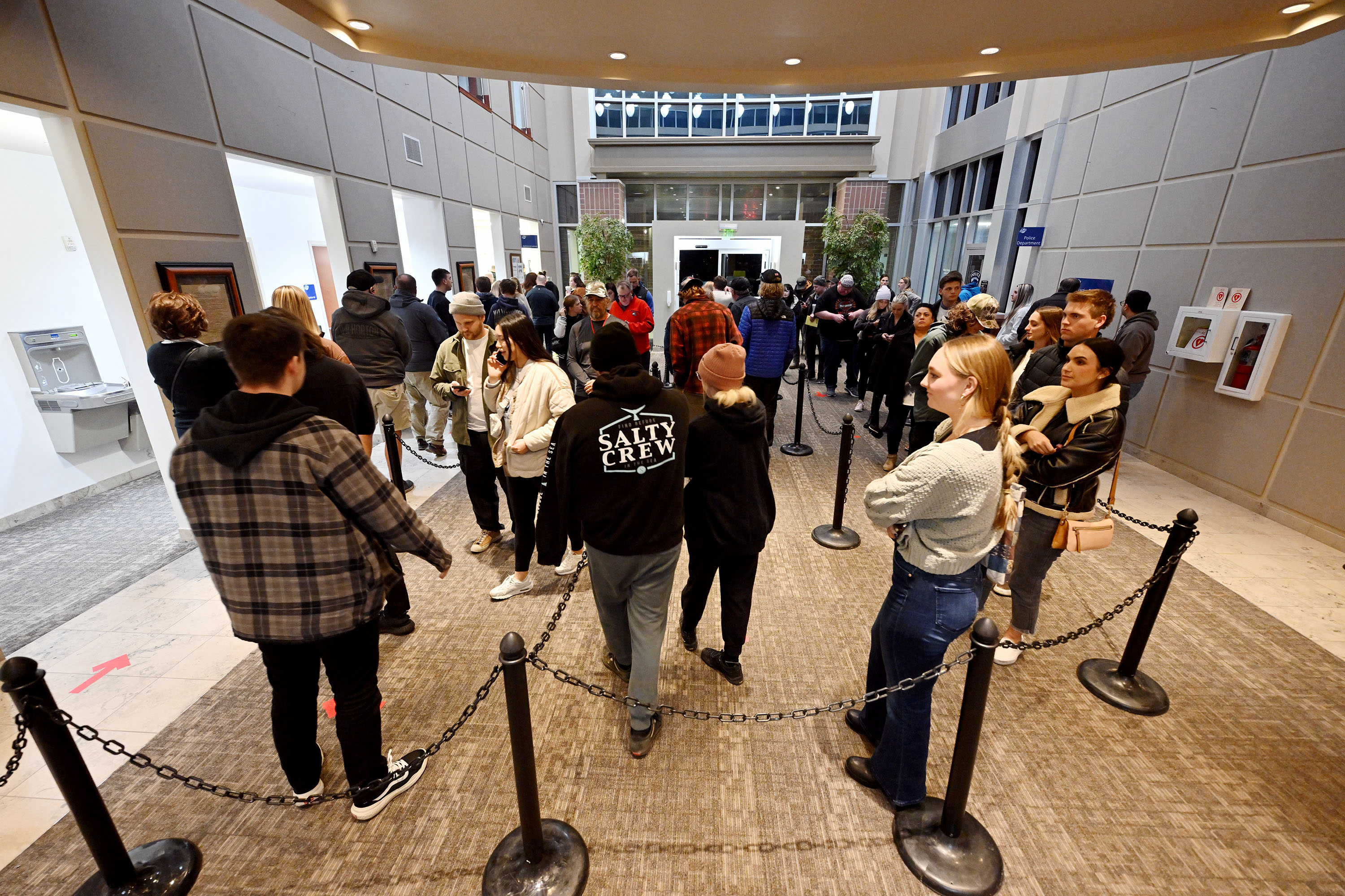 Utah residents wait in line cast their votes in Draper on Tuesday. Three Utah House races tightened as new vote totals were added on Thursday.