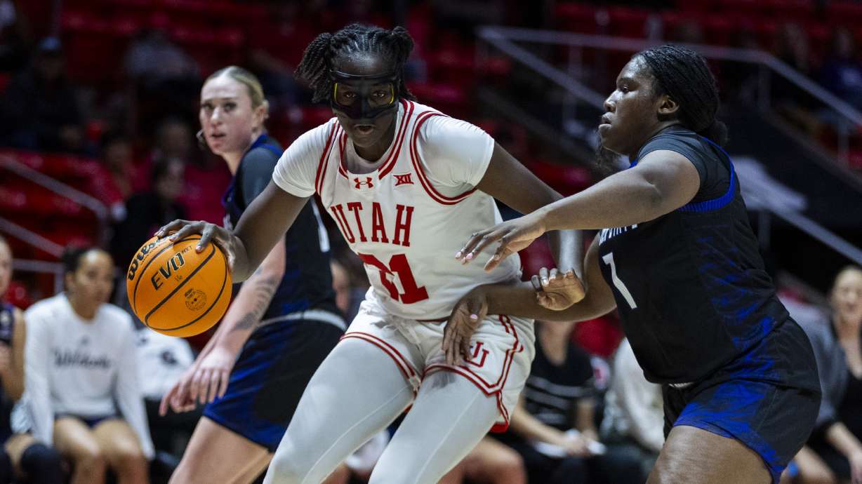 Utah Utes forward Maye Toure (21) drives the ball to the basket during a game between the University of Utah and Weber State women’s basketball teams at the Huntsman Center on the campus of the University of Utah in Salt Lake City on Thursday, Nov. 7, 2024.