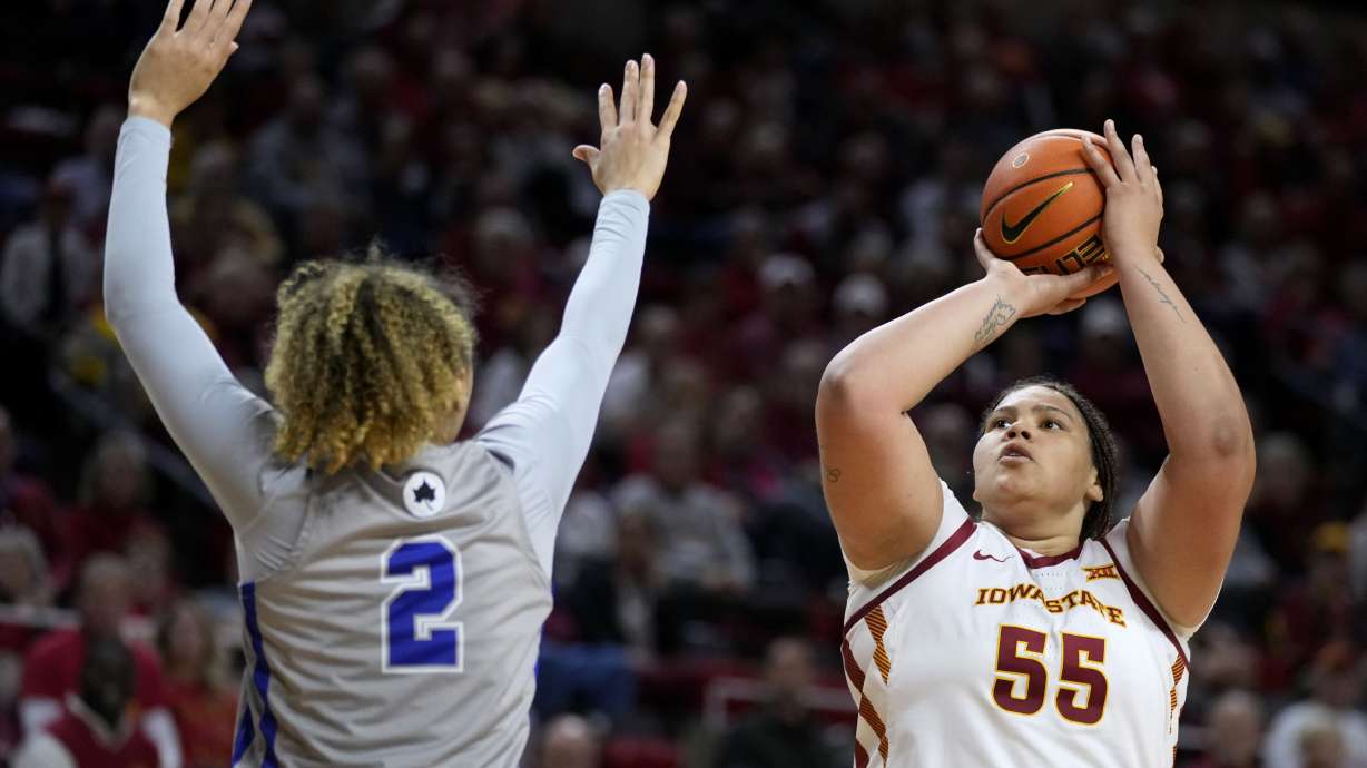 Iowa State center Audi Crooks (55) shoots over Indiana State guard Savannah White (2) during the second half of an NCAA college basketball game, Thursday, Nov. 7, 2024, in Ames, Iowa.