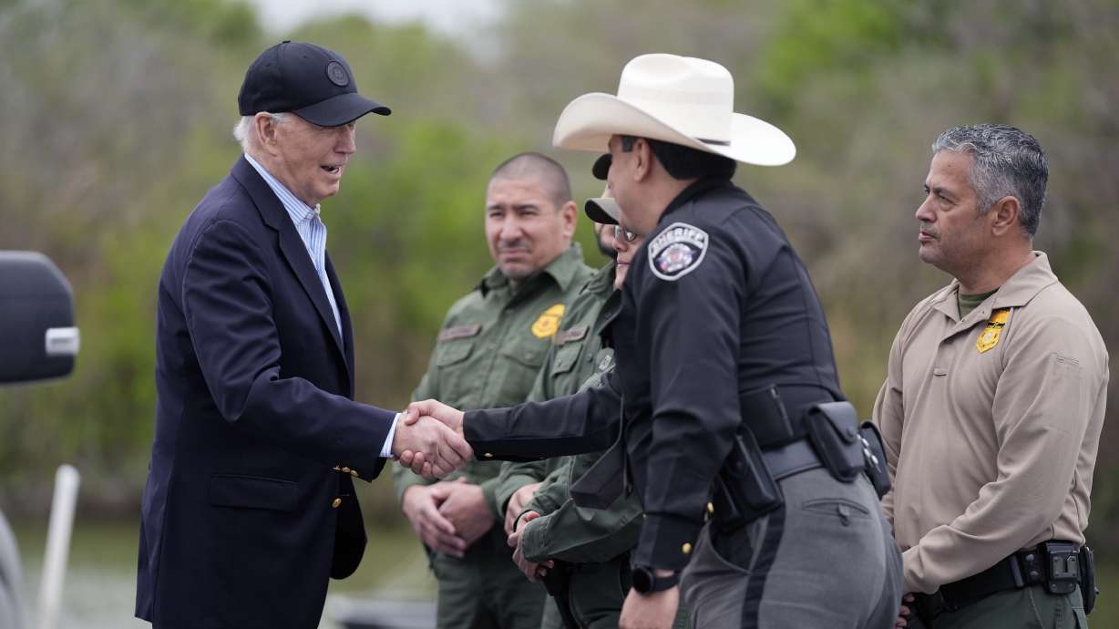 President Joe Biden talks with the U.S. Border Patrol and local officials, as he looks over the southern border, Feb. 29, in Brownsville, Texas. On Thursday, a federal judge ruled a Biden administration immigration policy overstepped its authority.