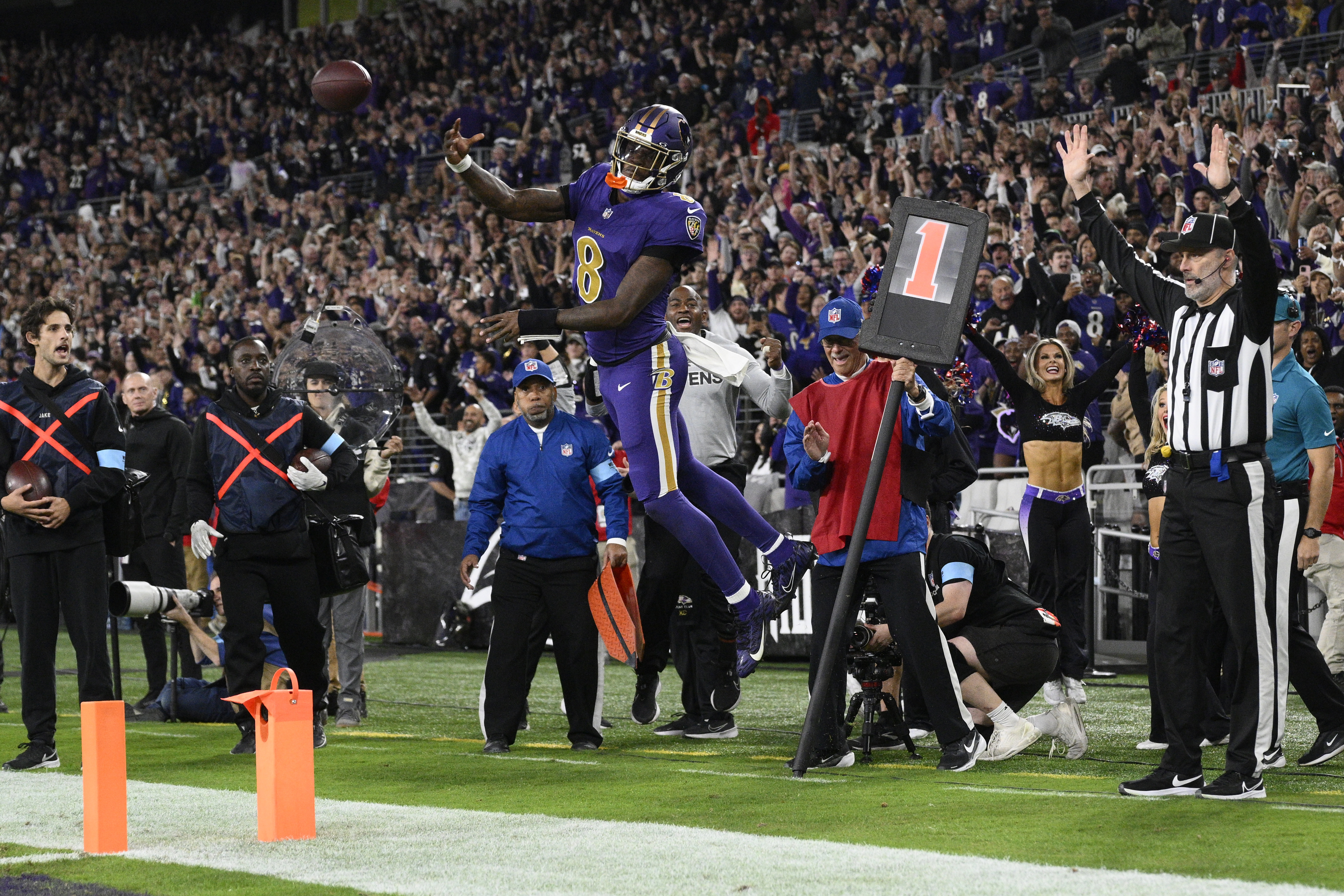 Baltimore Ravens quarterback Lamar Jackson (8) celebrates scoring a two-point conversion during the second half of an NFL football game against the Cincinnati Bengals, Thursday, Nov. 7, 2024, in Baltimore.
