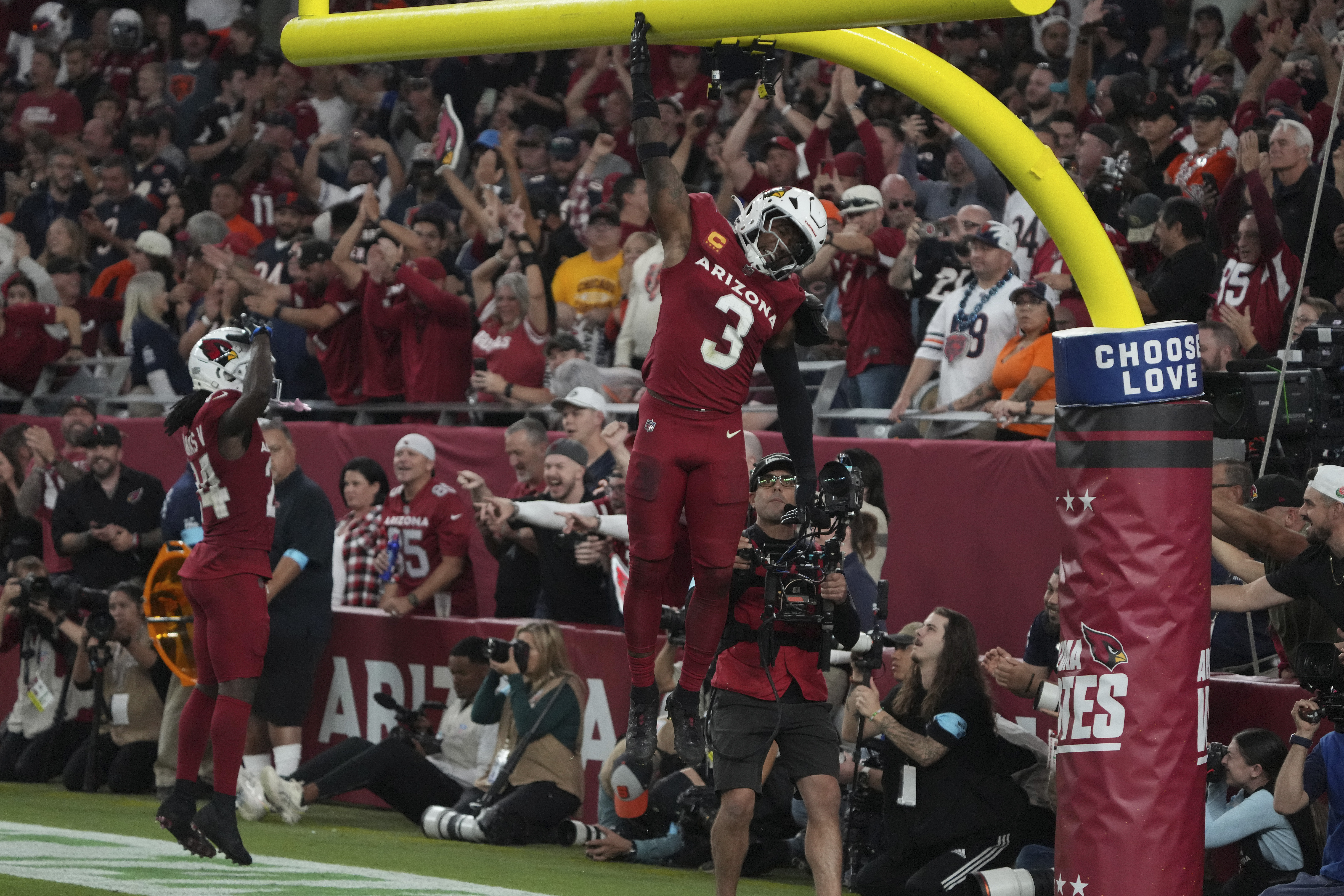 Arizona Cardinals safety Budda Baker (3) celebrates after a safety in the end zone against the Chicago Bears during the second half of an NFL football game, Sunday, Nov. 3, 2024, in Glendale, Ariz.