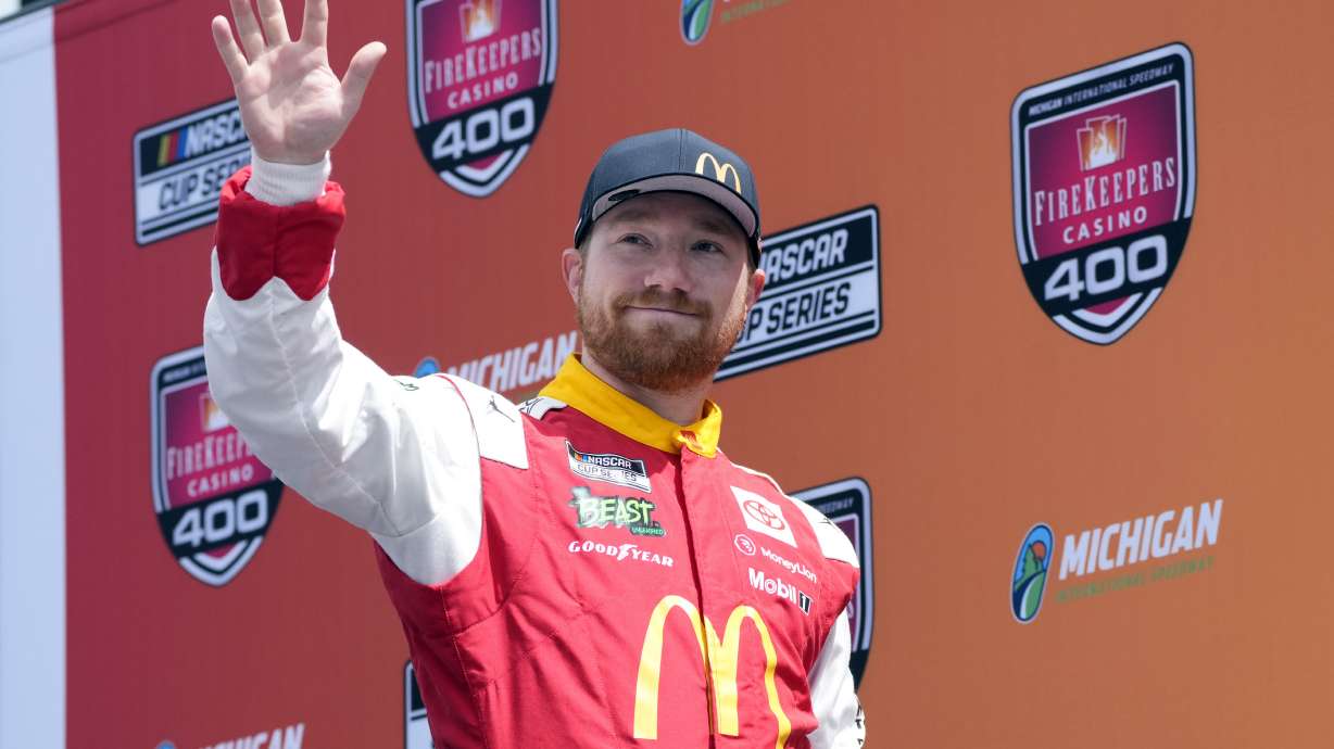 FILE - Tyler Reddick is introduced before a NASCAR Cup Series auto race at Michigan International Speedway, Aug. 18, 2024, in Brooklyn, Mich.