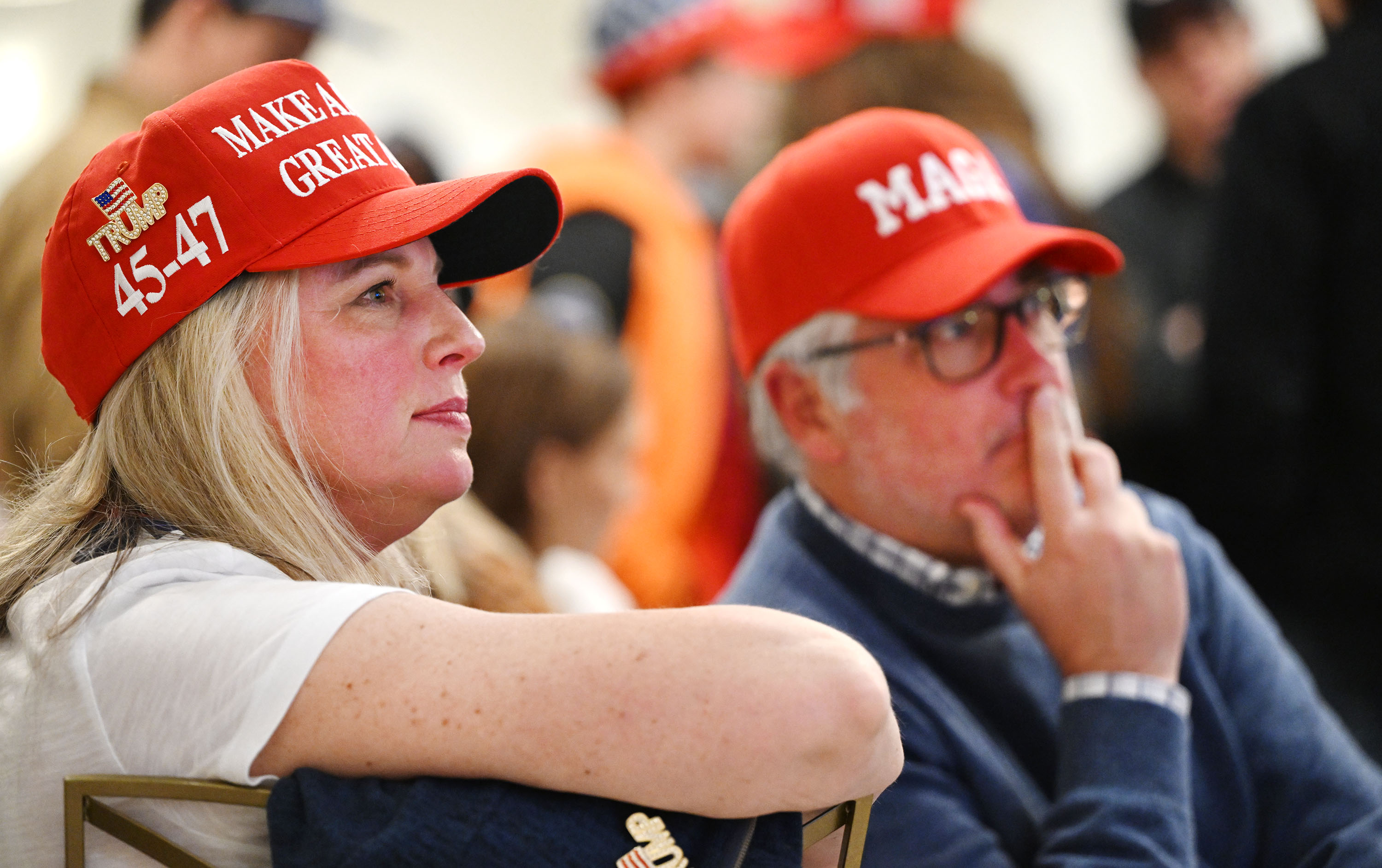 Robin and Patrick Parker watch broadcasts while at the Utah GOP party in Draper on Tuesday. President-elect Donald Trump improved his vote share in Utah compared to 2020, but is still running behind Republicans in most major races in the state.