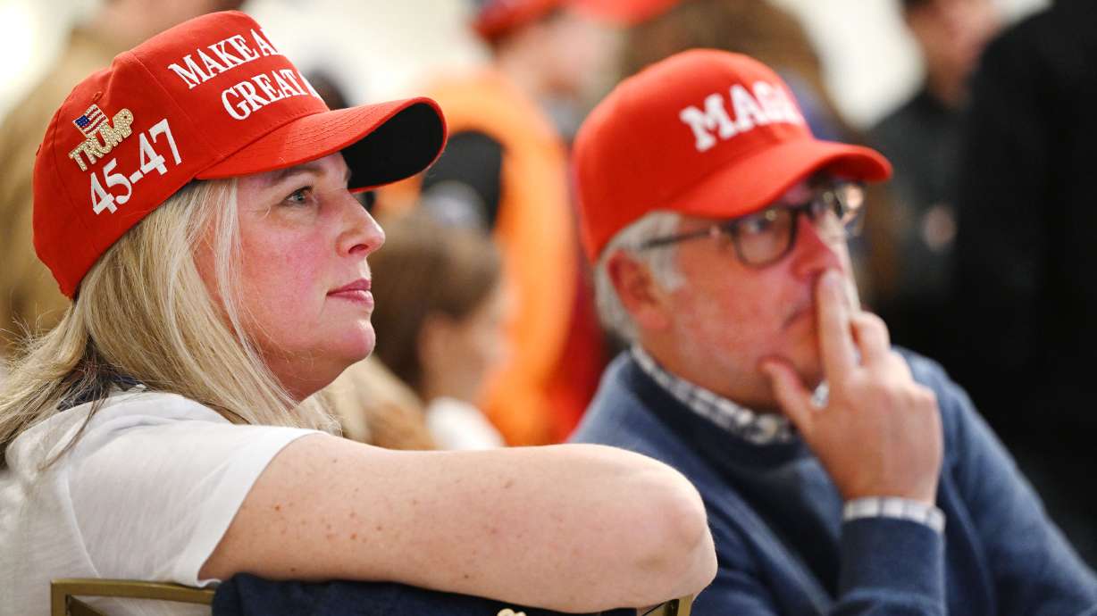 Robin and Patrick Parker watch broadcasts while at the Utah GOP party in Draper on Tuesday. President-elect Donald Trump improved his vote share in Utah compared to 2020, but is still running behind Republicans in most major races in the state.