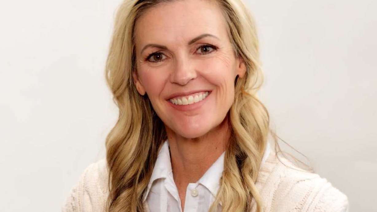 Wasatch County Council candidate Jami Hewlett was removed from her appointment as Heber Planning Commission alternate in a council meeting Tuesday.